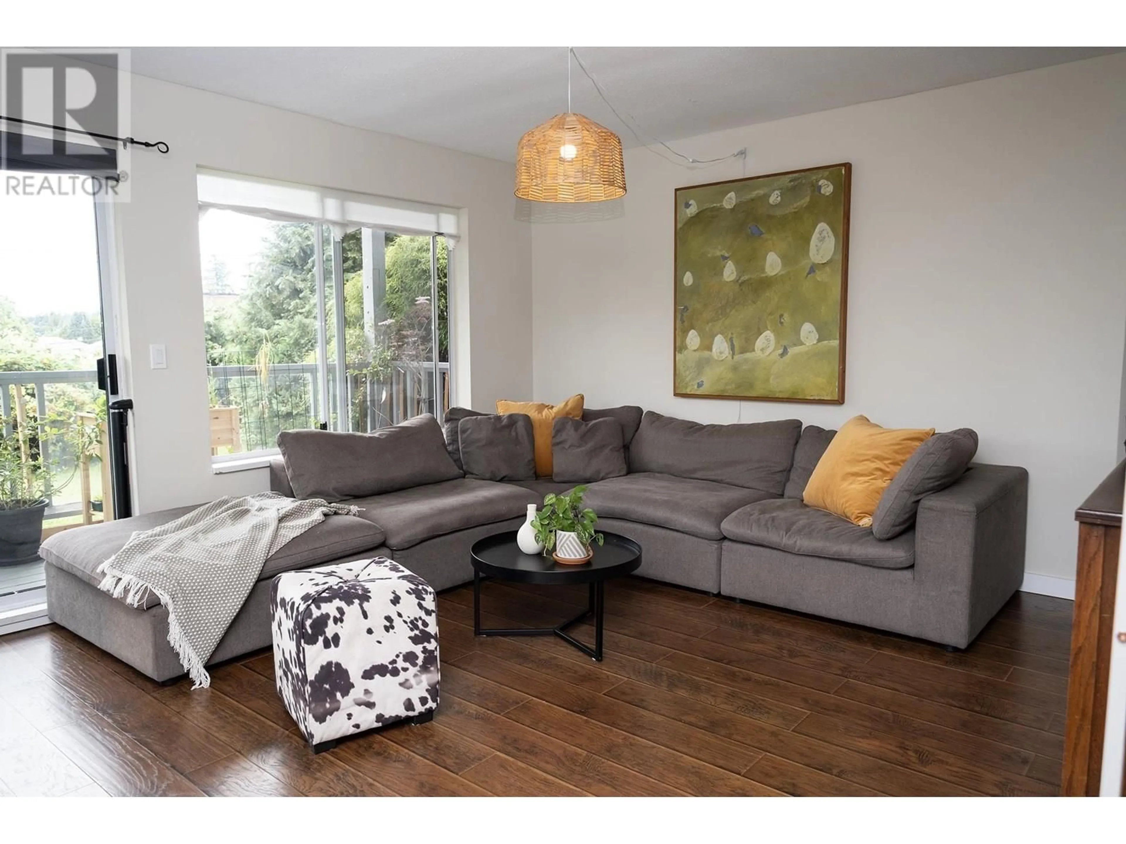 Living room with furniture, wood/laminate floor for 1 - 756 GIBSONS WAY, Gibsons British Columbia V0N1V9