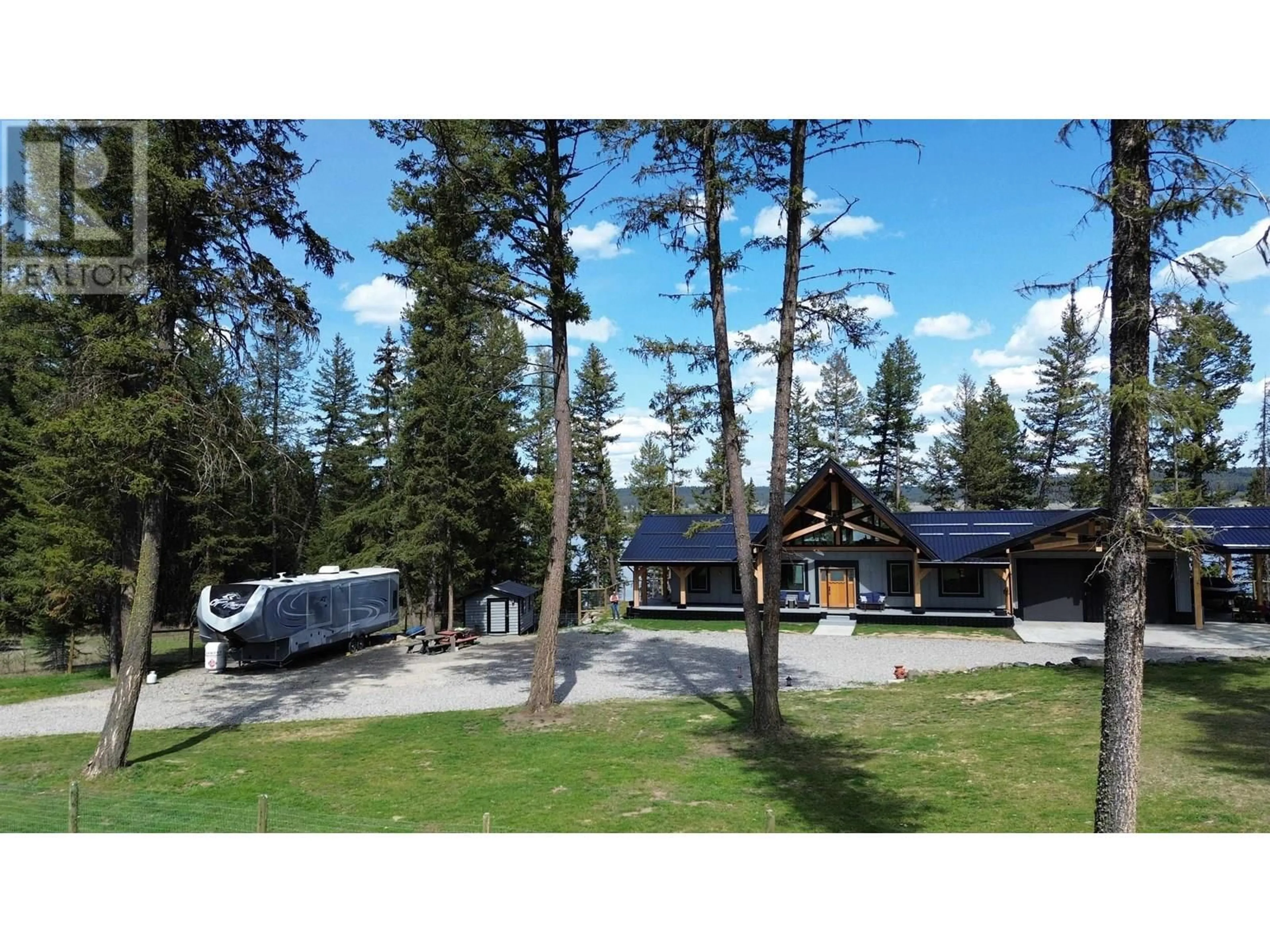 A pic from outside/outdoor area/front of a property/back of a property/a pic from drone, unknown for 4164 MOSER ROAD, Lac La Hache British Columbia V0K1T0