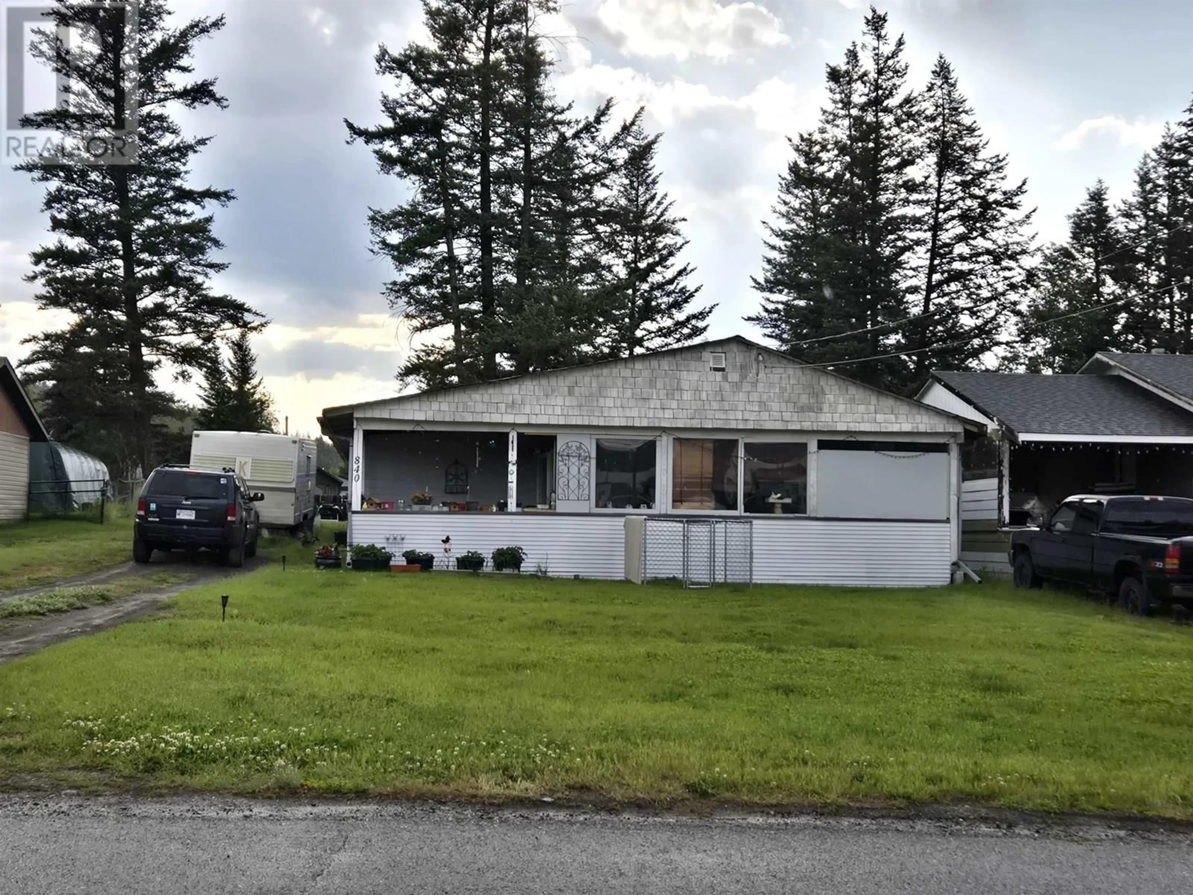 Home with vinyl exterior material, street for 840 SCOTT ROAD, 100 Mile House British Columbia V0K2E0