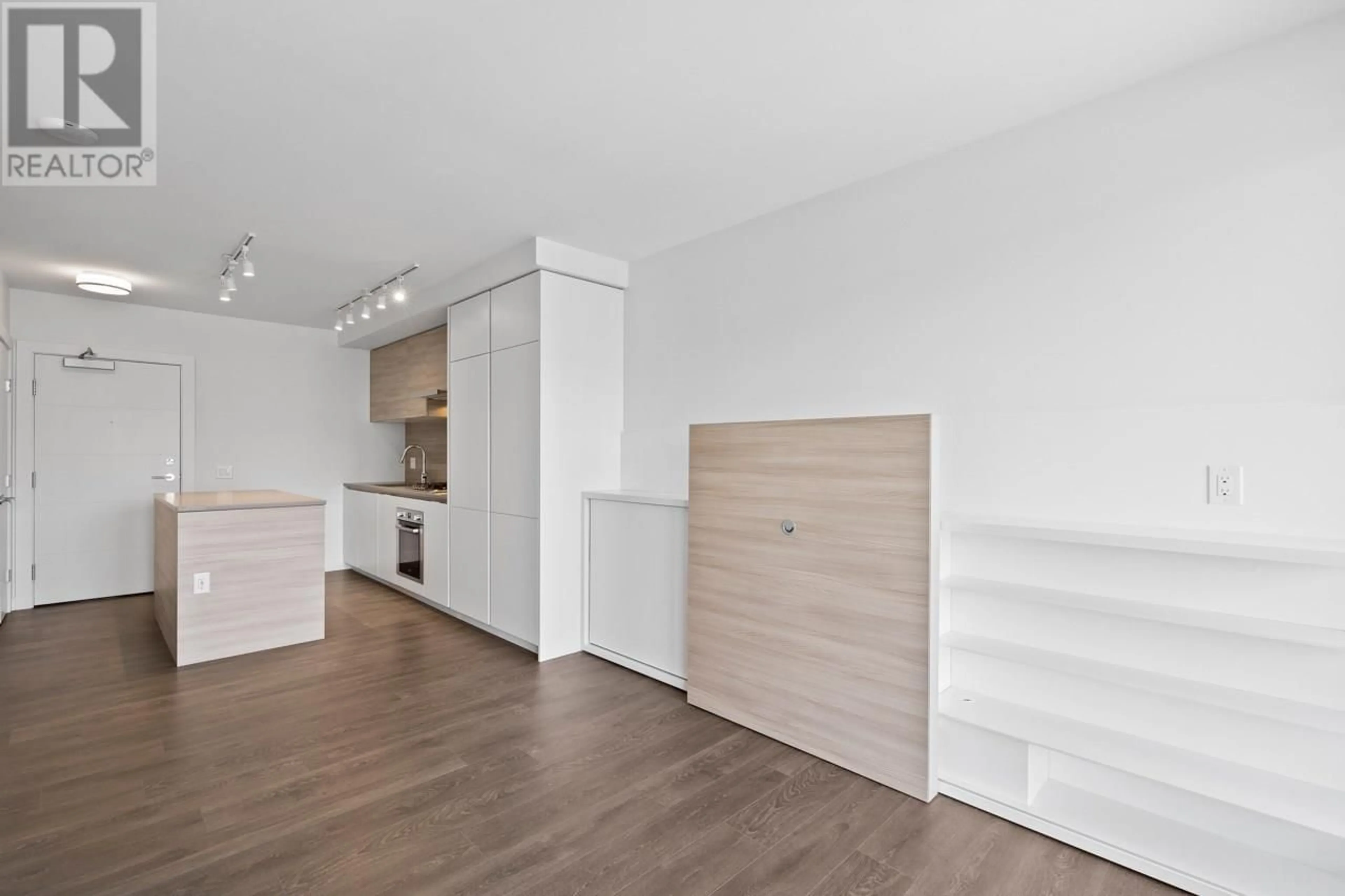 Open concept kitchen, wood/laminate floor for 1508 - 652 WHITING WAY, Coquitlam British Columbia V3J0K3