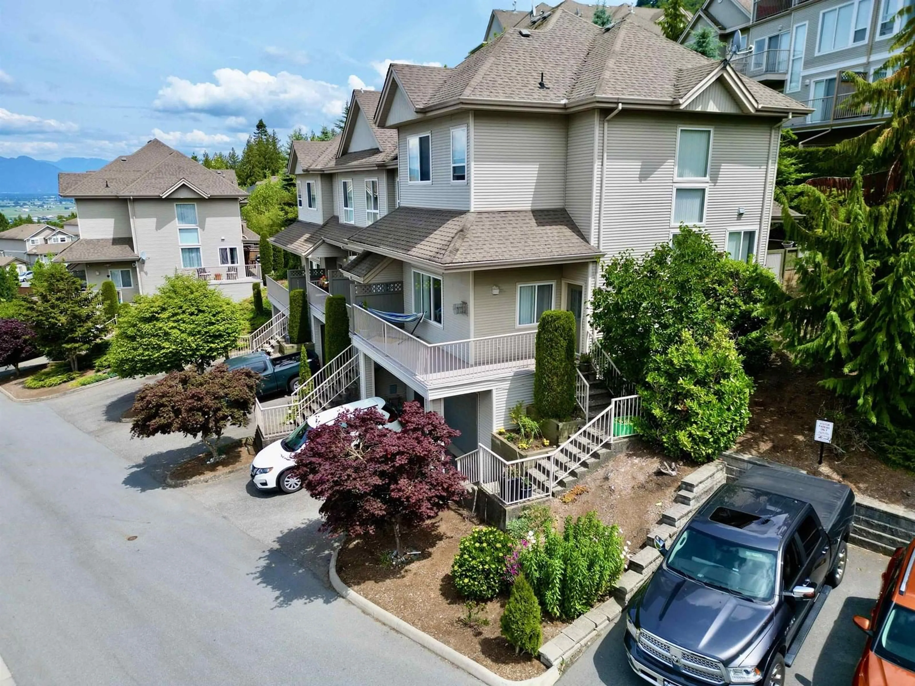 A pic from outside/outdoor area/front of a property/back of a property/a pic from drone, mountain view for 1504 - 5260 GOLDSPRING PLACE, Chilliwack British Columbia V2R5S5