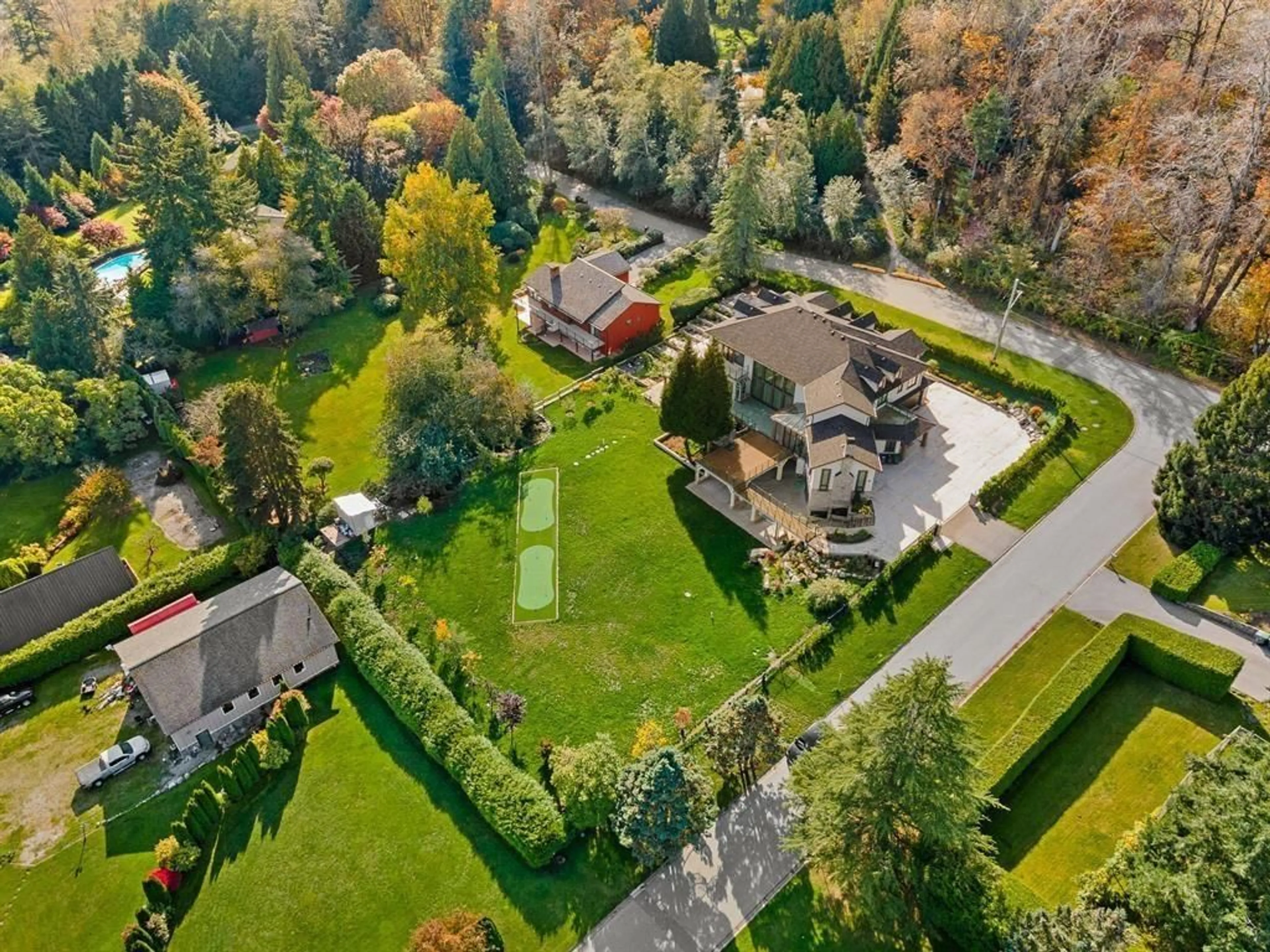 A pic from outside/outdoor area/front of a property/back of a property/a pic from drone, street for 1888 180, Surrey British Columbia V3Z9V2