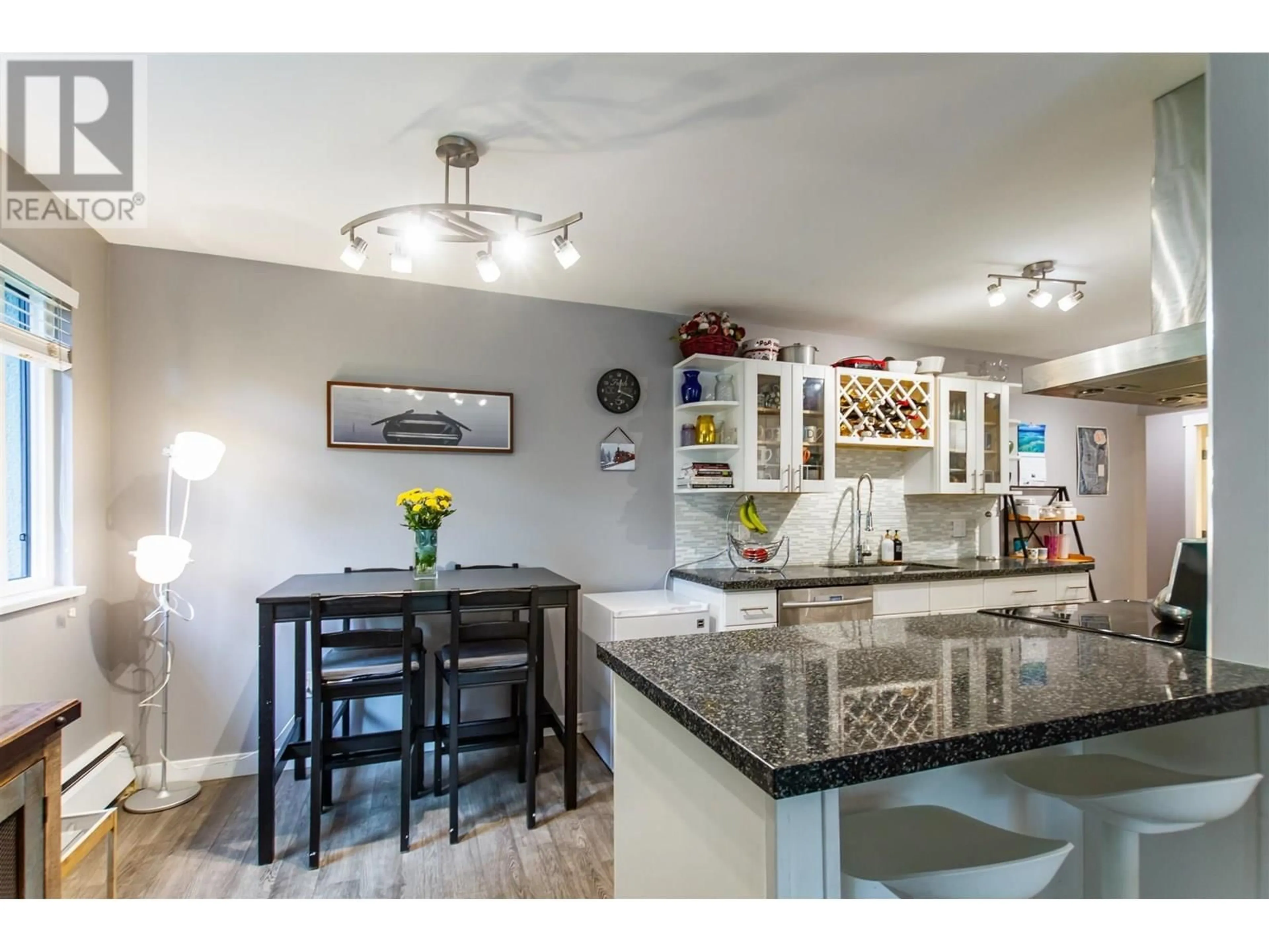 Open concept kitchen, ceramic/tile floor for 305 - 3901 CARRIGAN COURT, Burnaby British Columbia V3N4K1