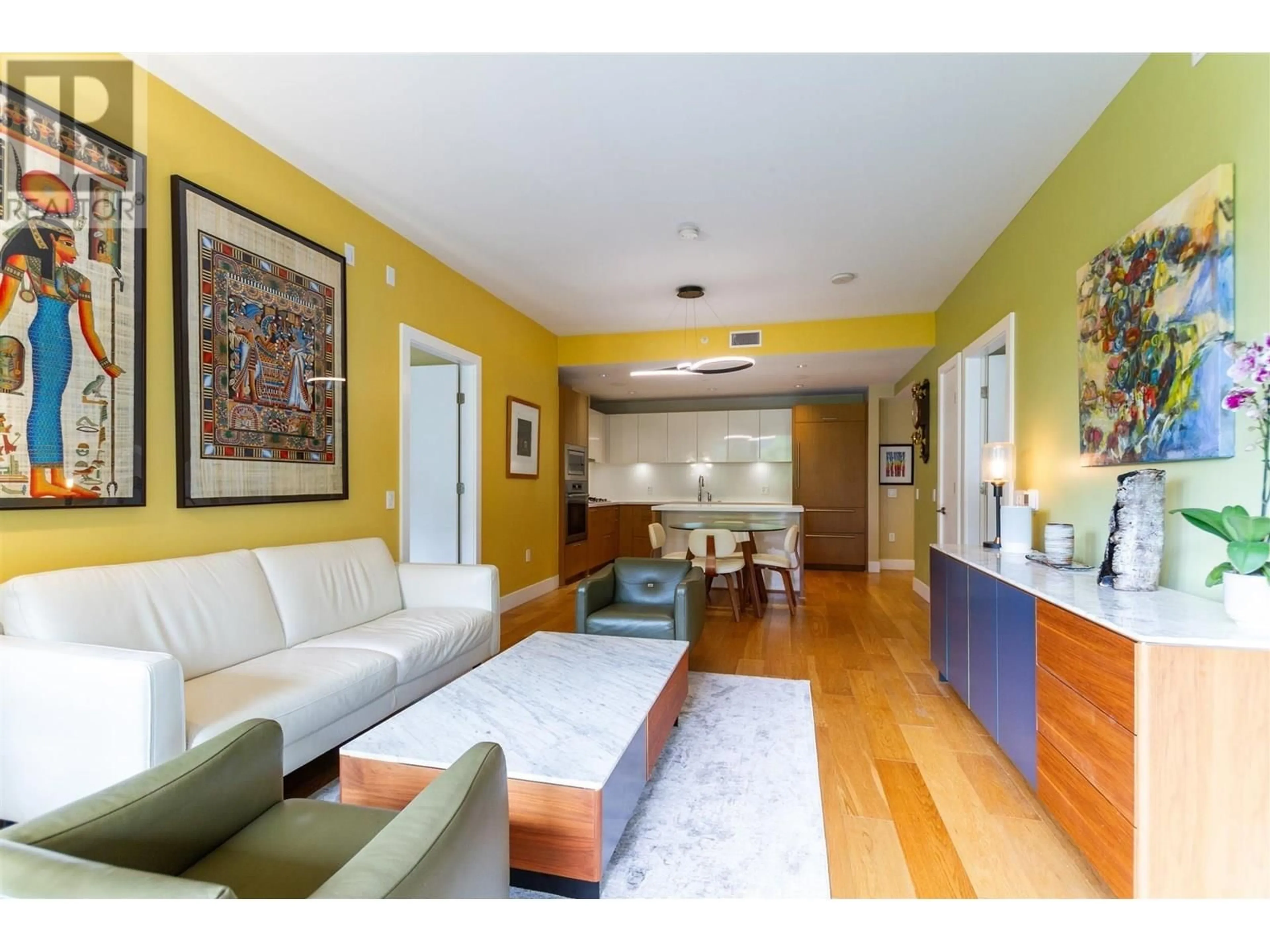 Living room with furniture, wood/laminate floor for 200 - 866 ARTHUR ERICKSON PLACE, West Vancouver British Columbia V7T0B2