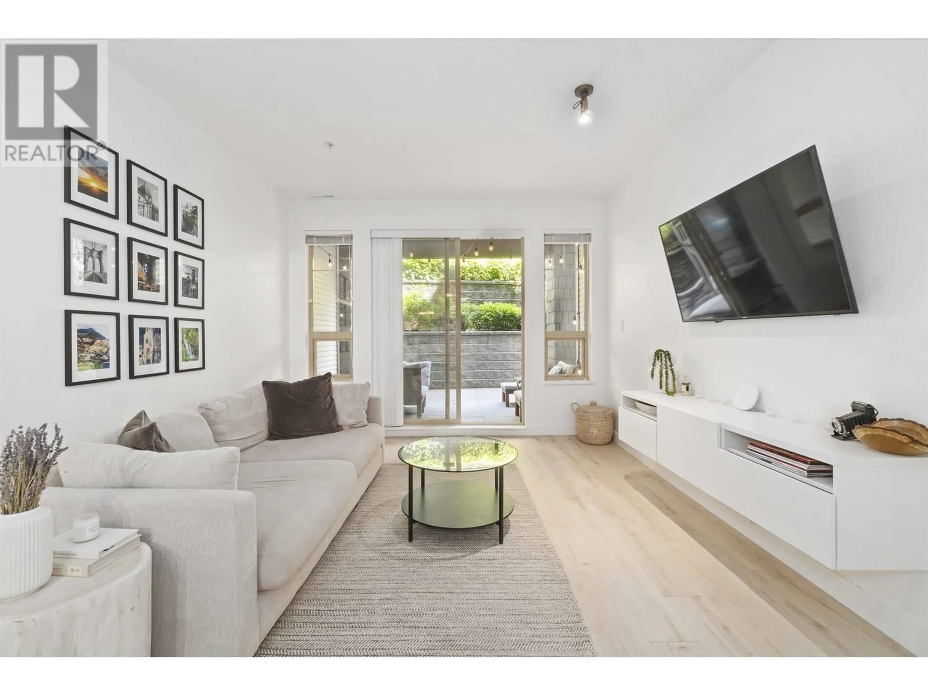 Living room with furniture, unknown for 101 - 2969 WHISPER WAY, Coquitlam British Columbia V3E3S8
