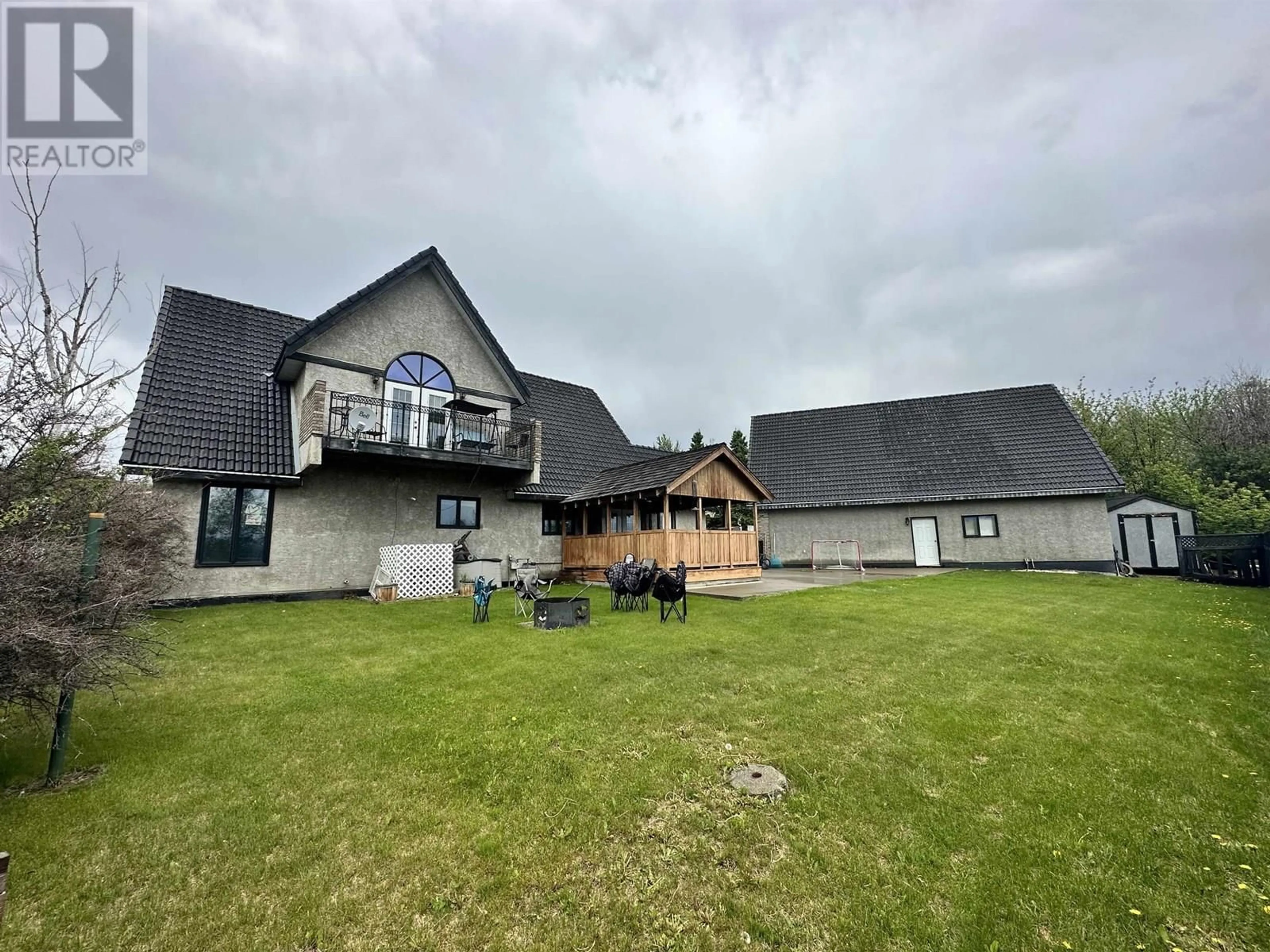 A pic from outside/outdoor area/front of a property/back of a property/a pic from drone, building for 5516 MINNAKER CRESCENT, Fort Nelson British Columbia V0C1R0