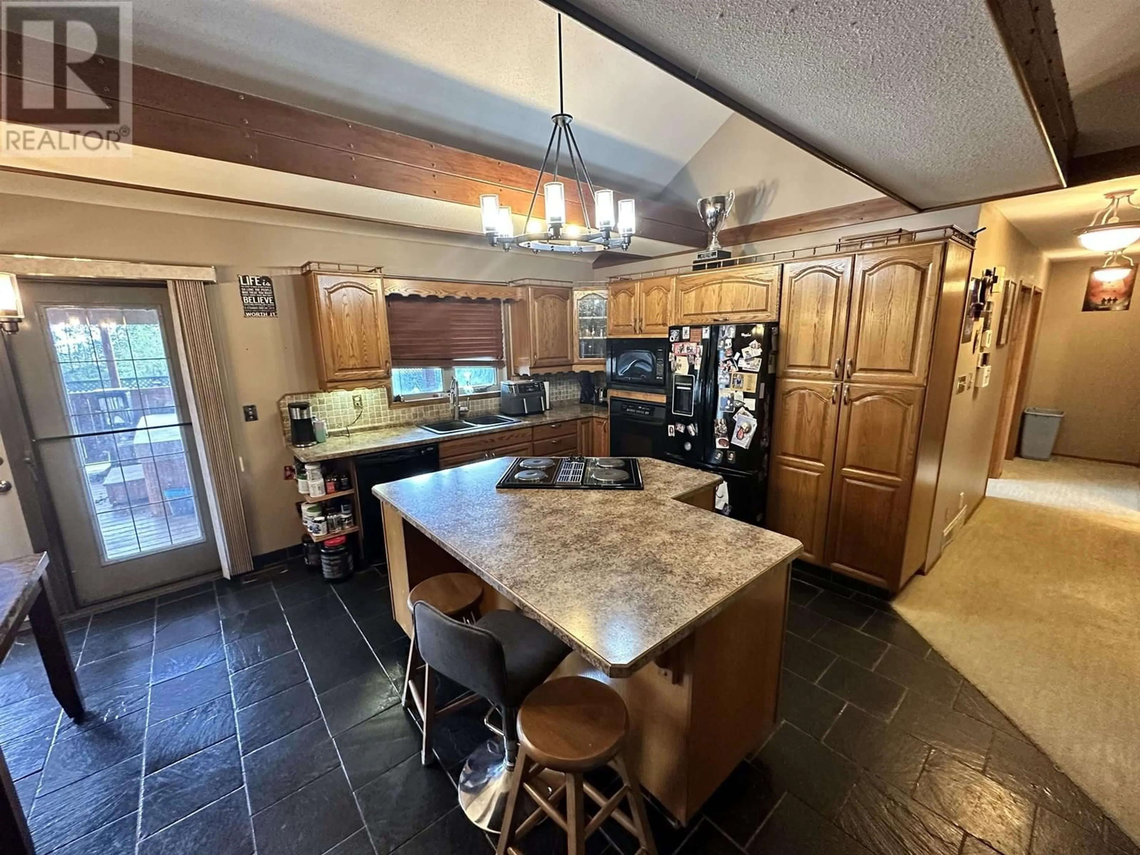 Open concept kitchen, ceramic/tile floor for 5516 MINNAKER CRESCENT, Fort Nelson British Columbia V0C1R0