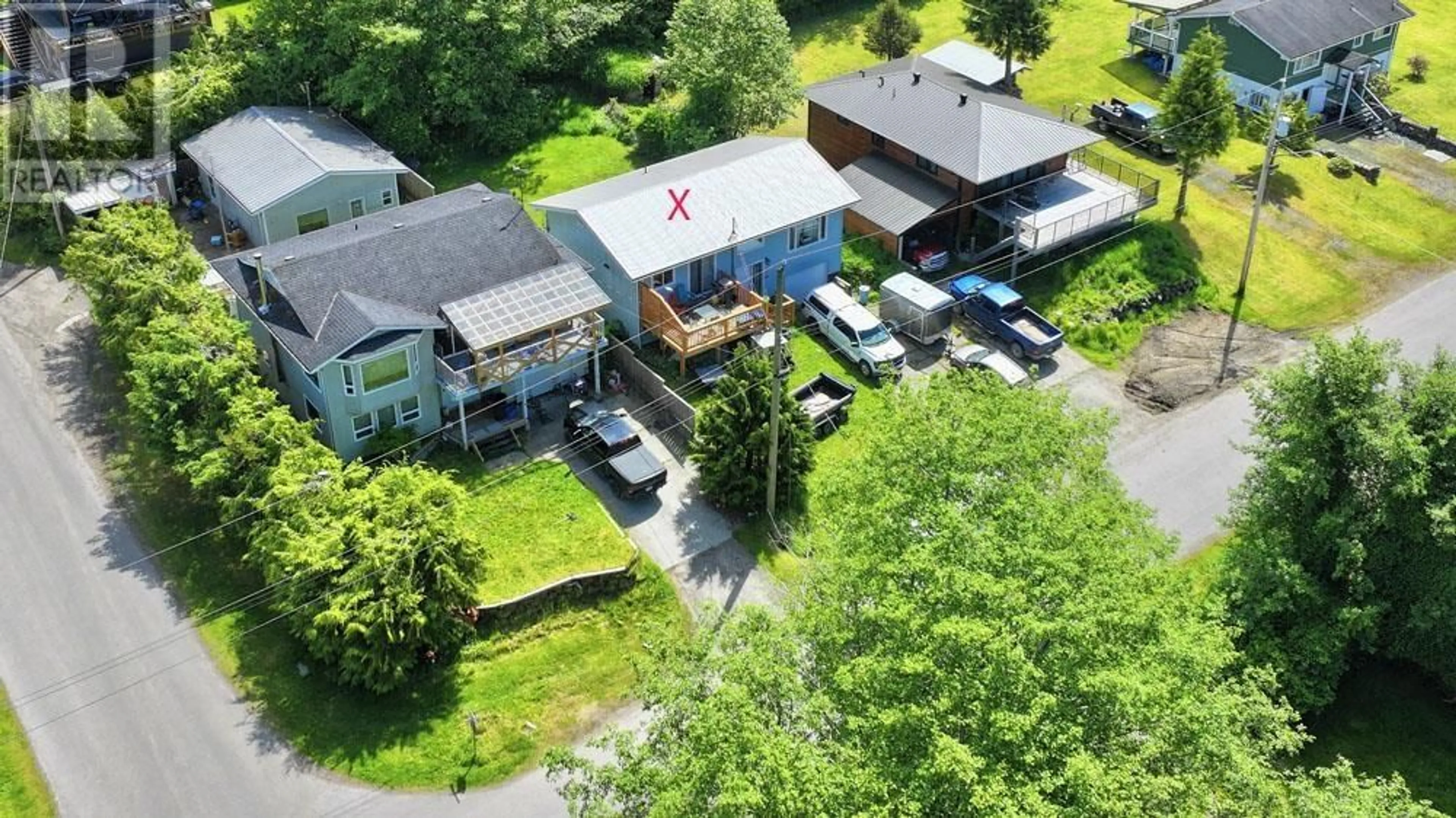 A pic from outside/outdoor area/front of a property/back of a property/a pic from drone, unknown for 33 YAKOUN STREET, Port Clements British Columbia V0T1R0