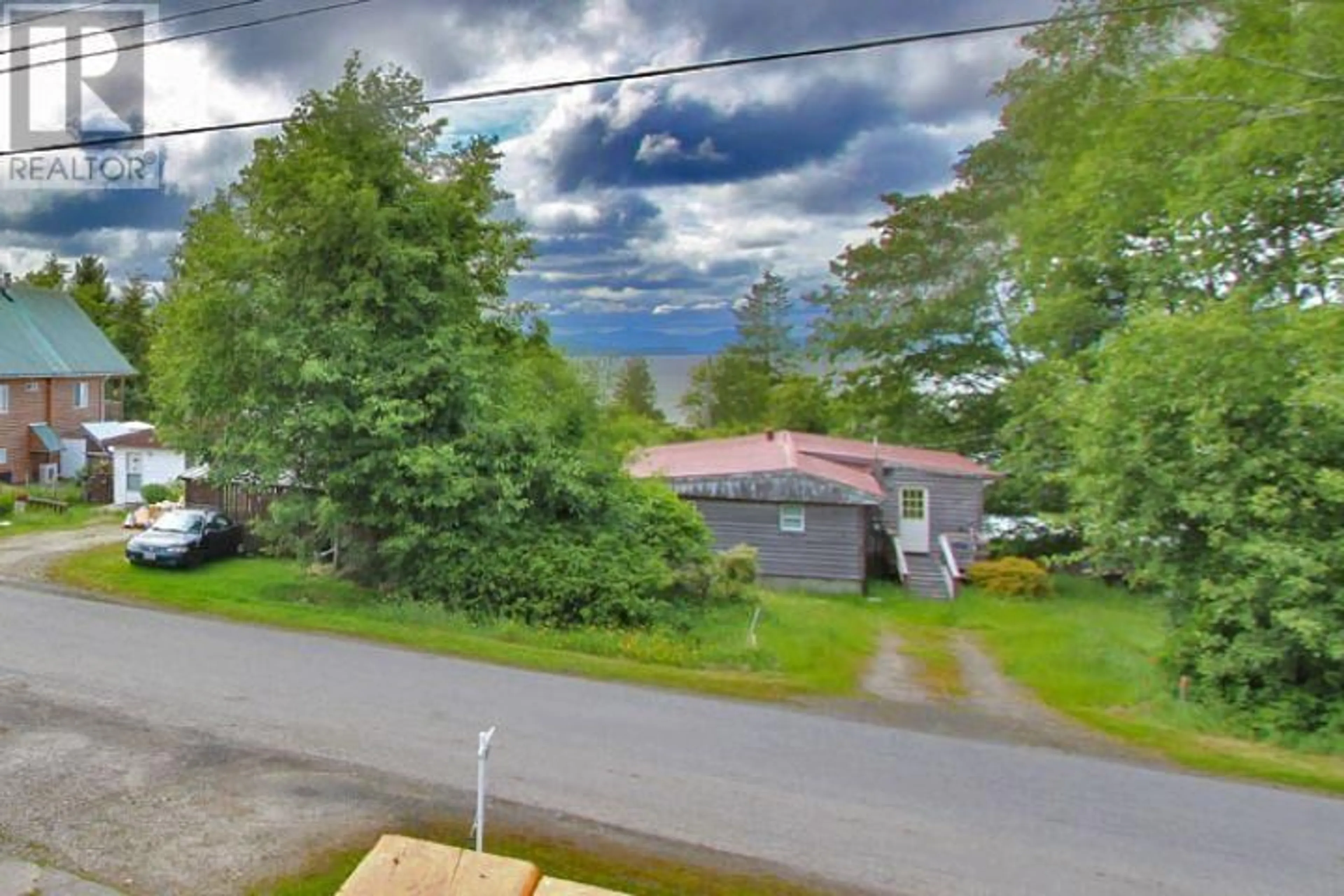 A pic from outside/outdoor area/front of a property/back of a property/a pic from drone, unknown for 33 YAKOUN STREET, Port Clements British Columbia V0T1R0