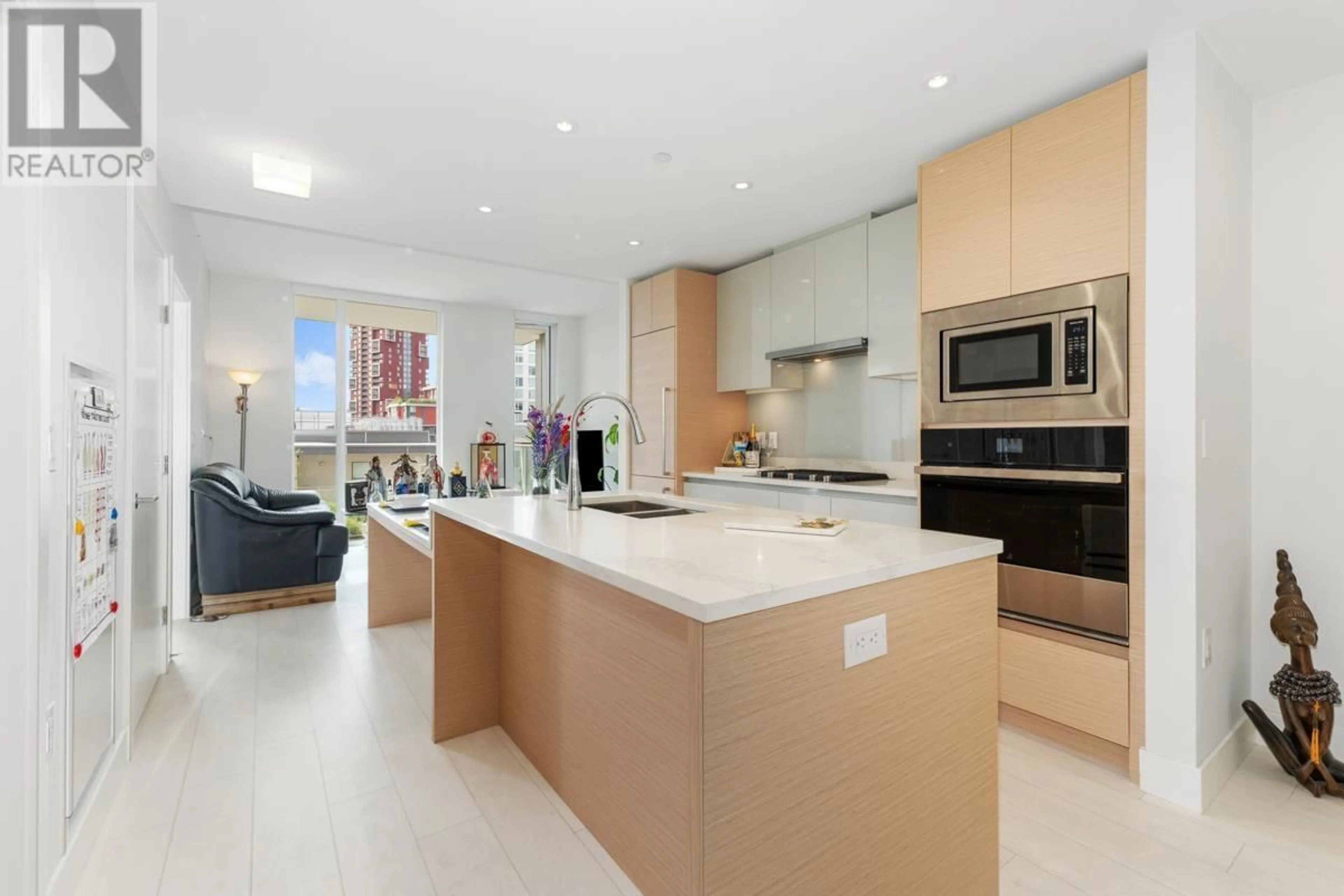 Open concept kitchen, ceramic/tile floor for 701 - 3538 SAWMILL CRESCENT, Vancouver British Columbia V5S0J8