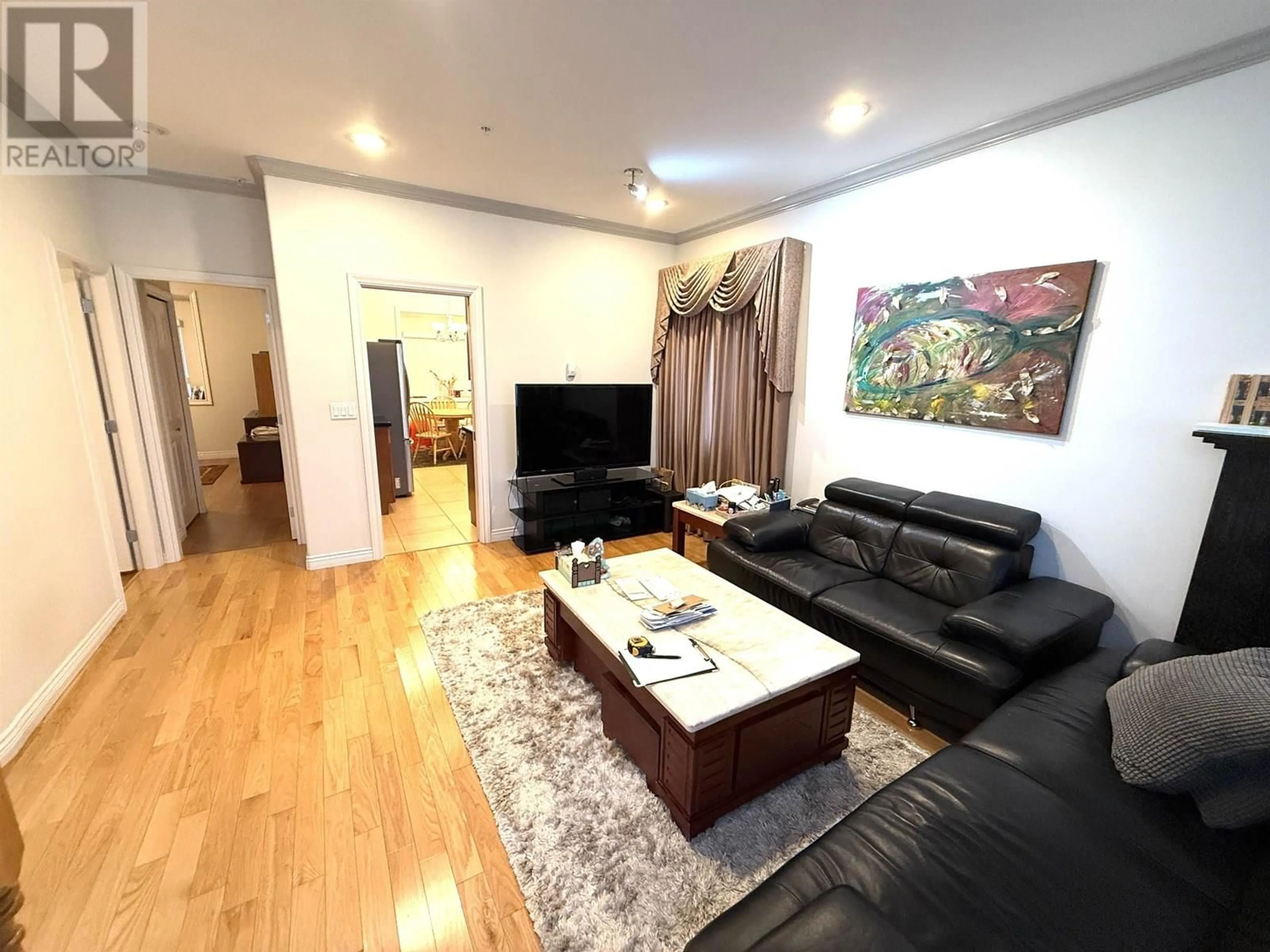 Living room with furniture, wood/laminate floor for 2222 44TH AVENUE, Vancouver British Columbia V5P1N4