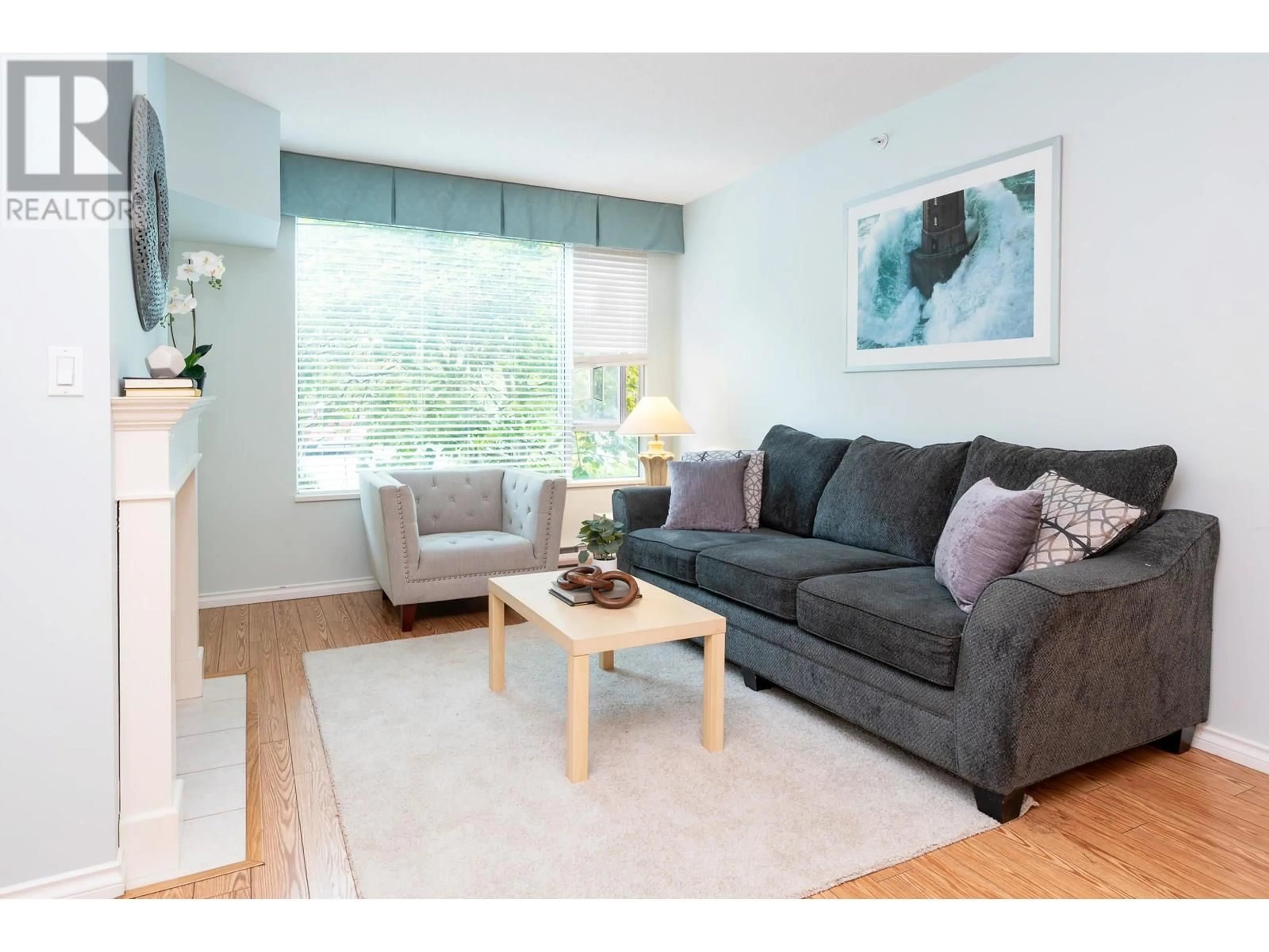 Living room with furniture, wood/laminate floor for 103 - 12148 224 STREET, Maple Ridge British Columbia V2X3N8