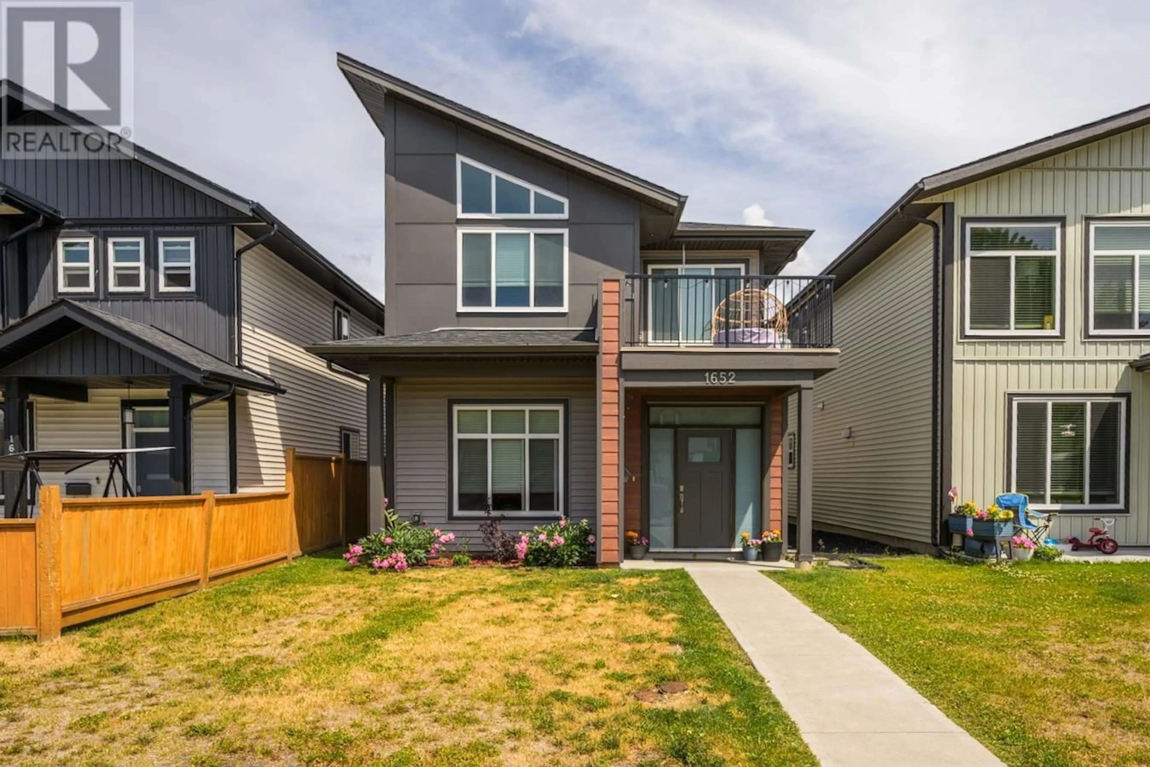 Home with brick exterior material, street for 1652 9TH AVENUE, Prince George British Columbia V2L3S1