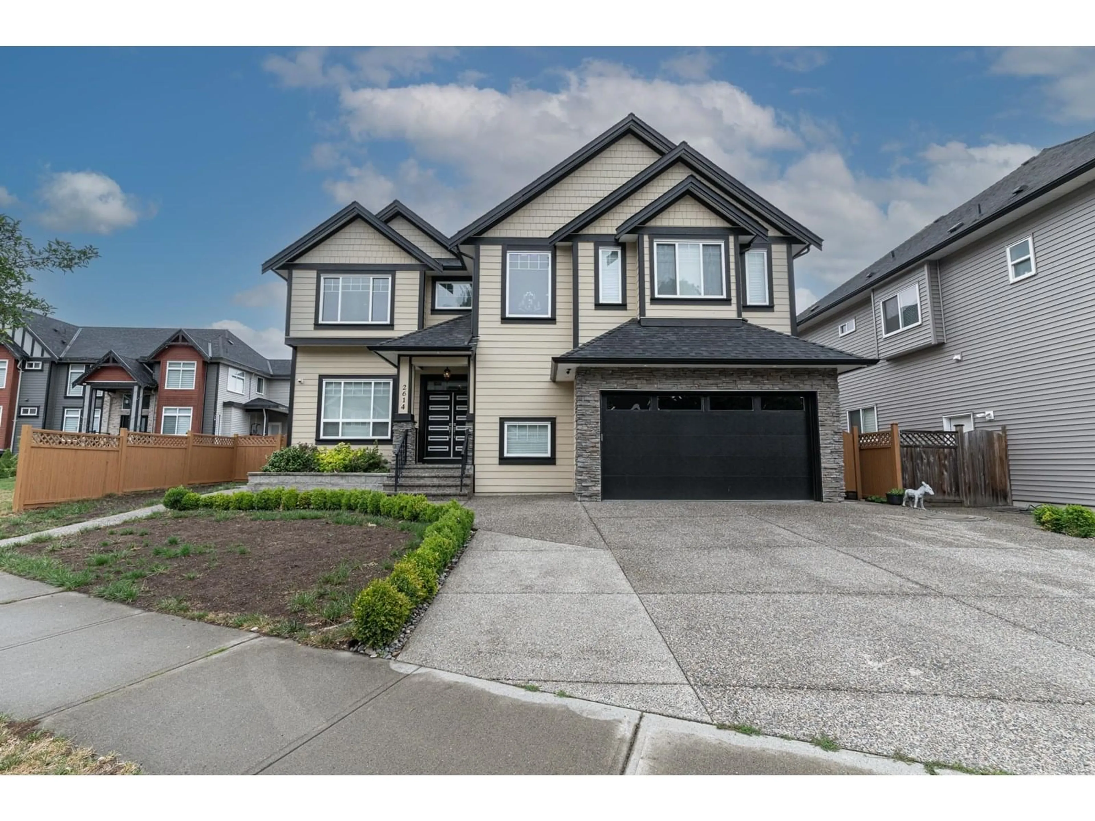 Home with brick exterior material, street for 2614 RAILCAR, Abbotsford British Columbia V4X0B8