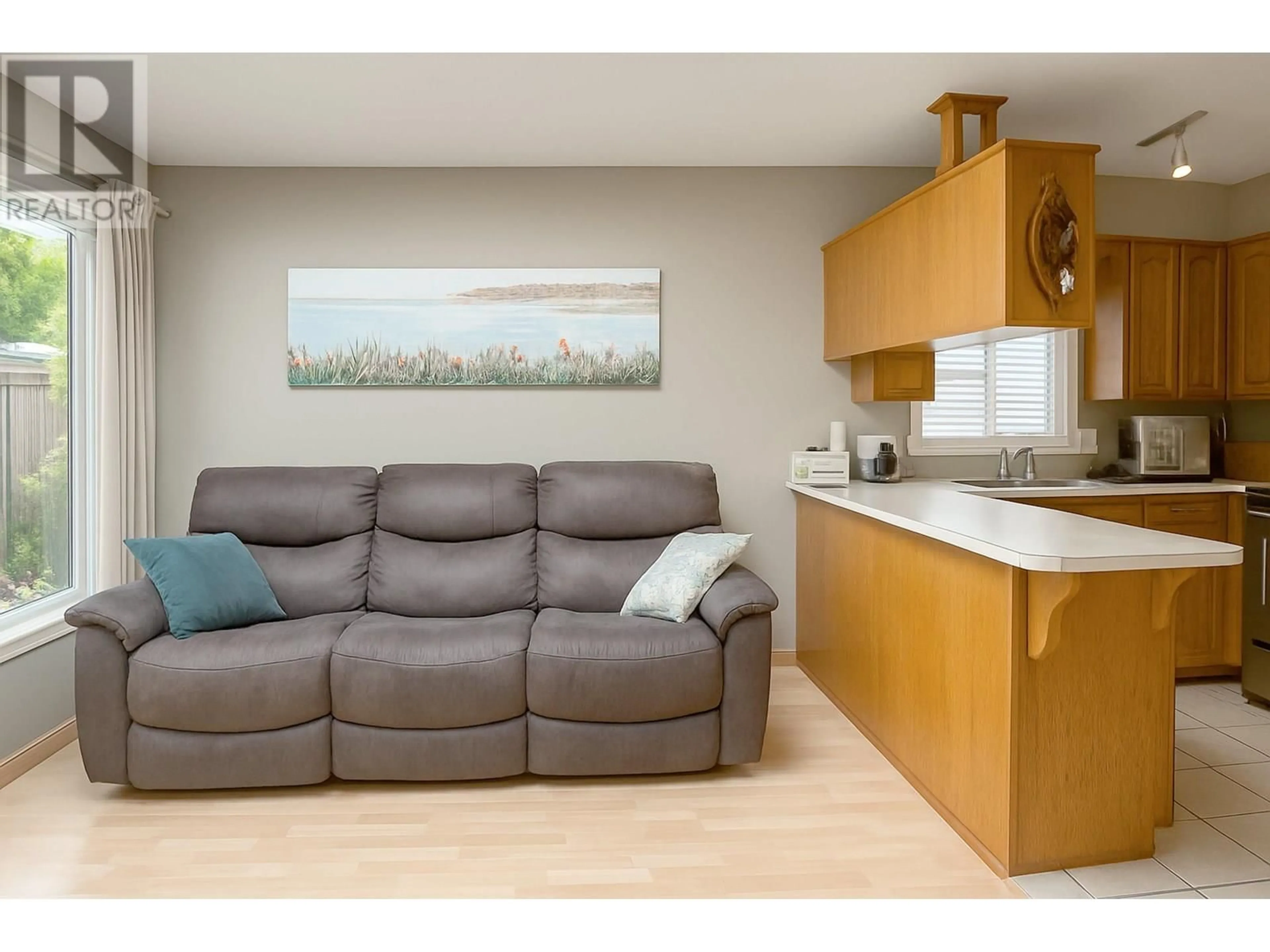 Living room with furniture, wood/laminate floor for 22070 126 AVENUE, Maple Ridge British Columbia V2X0V7