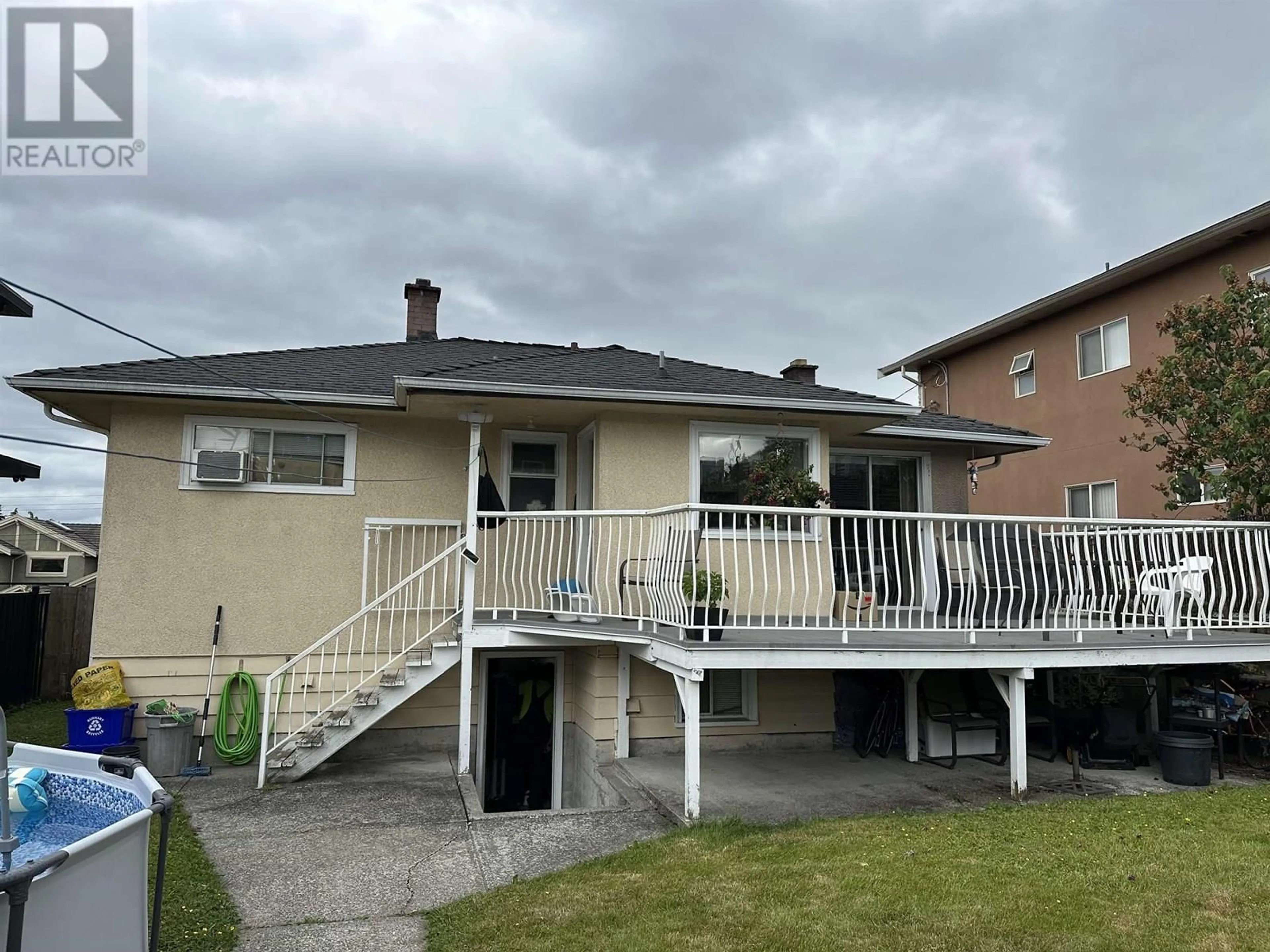 Home with vinyl exterior material, street for 5529 BOOTH AVENUE, Burnaby British Columbia V5H3A5