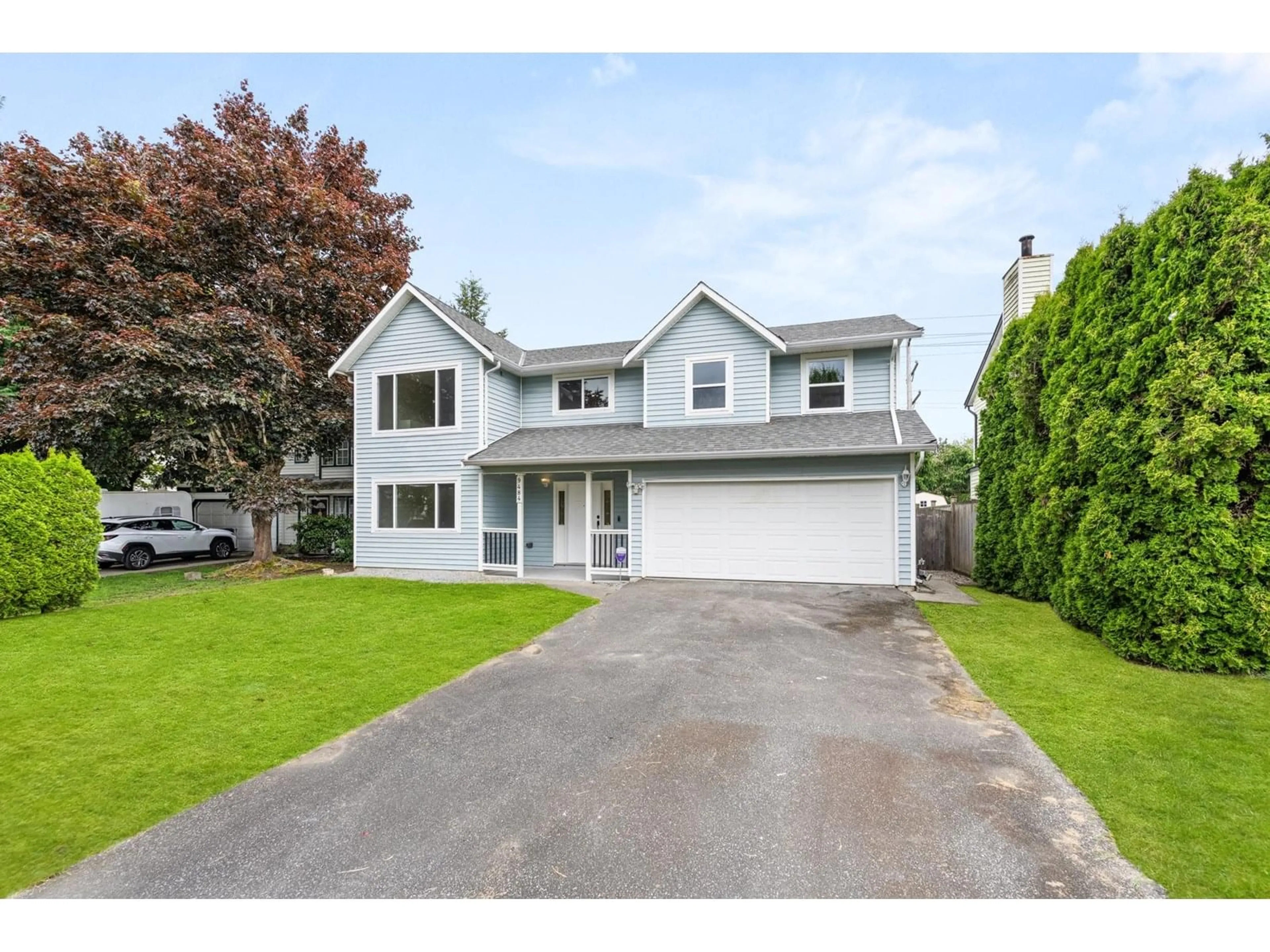 Home with vinyl exterior material, street for 9484 209B, Langley British Columbia V1M2A9
