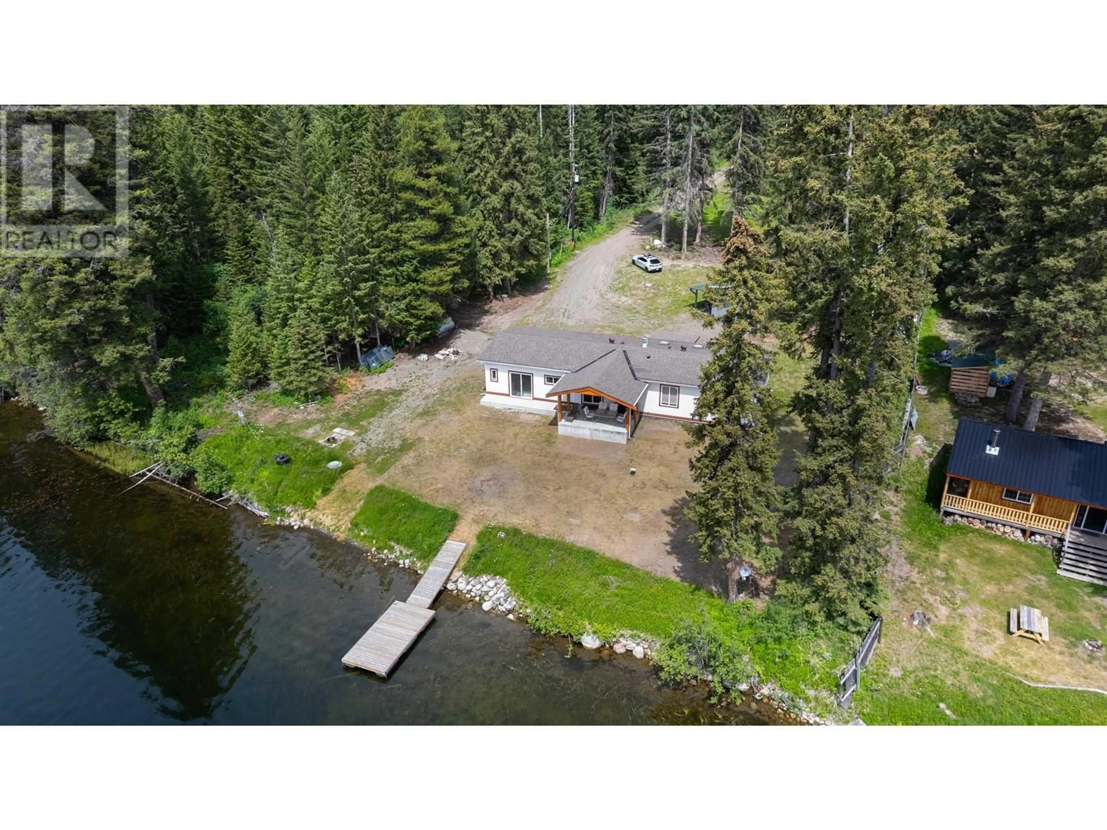 A pic from outside/outdoor area/front of a property/back of a property/a pic from drone, water/lake/river/ocean view for 5684 TIMOTHY LAKE ROAD, Lac La Hache British Columbia V0K1T0
