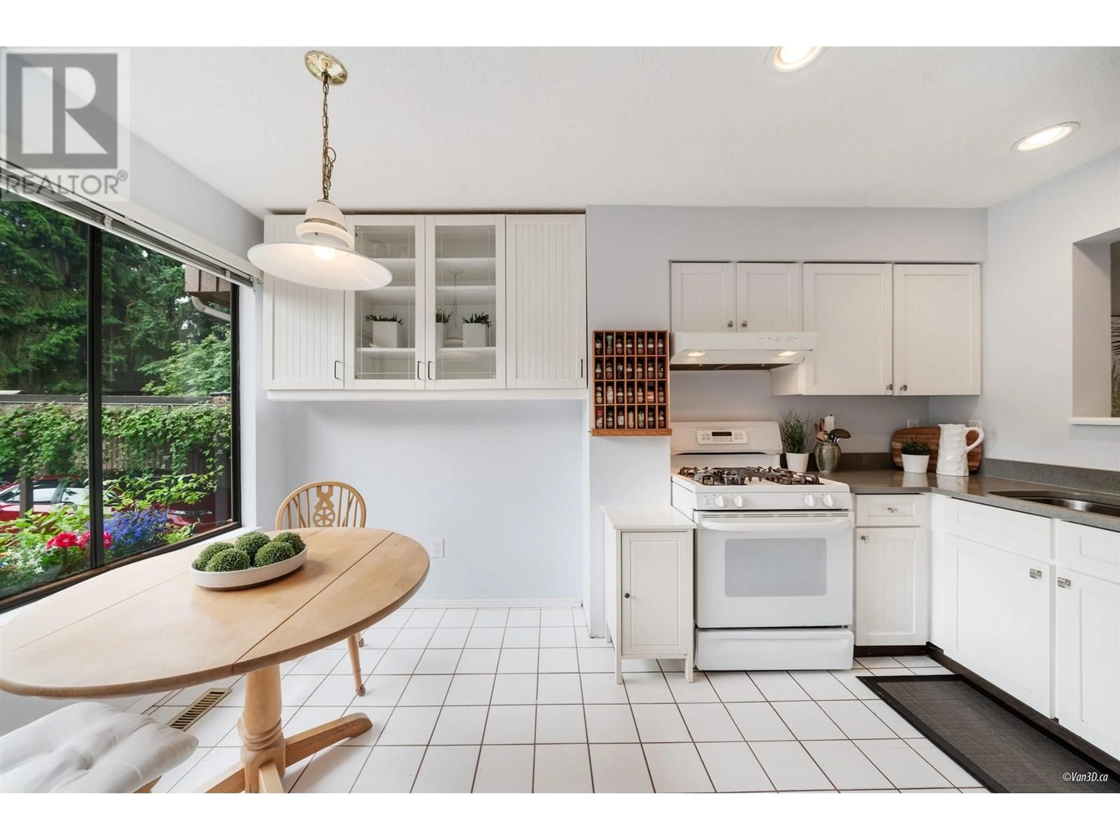 Open concept kitchen, ceramic/tile floor for 4740 DRIFTWOOD PLACE, Burnaby British Columbia V5G4E3