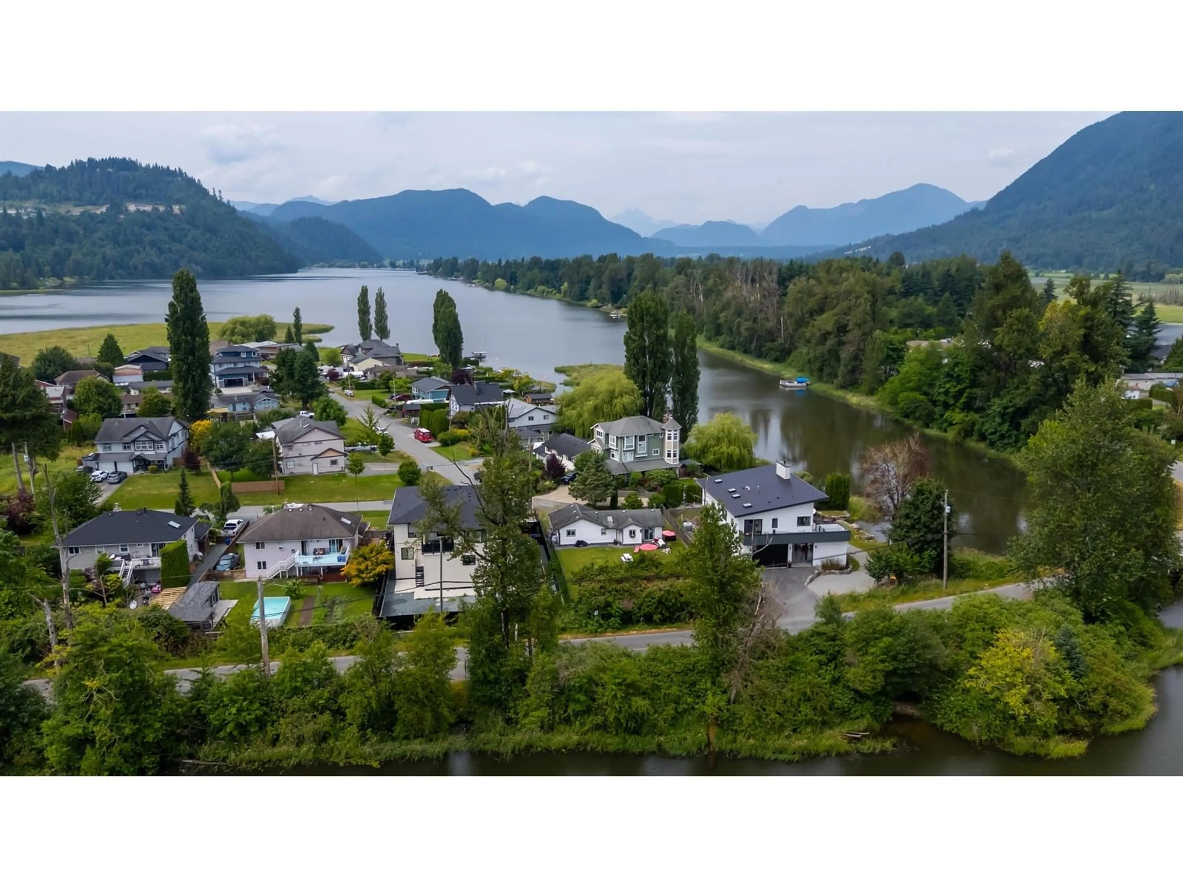 A pic from outside/outdoor area/front of a property/back of a property/a pic from drone, water/lake/river/ocean view for 35720 MOORE, Mission British Columbia V4X1Y3