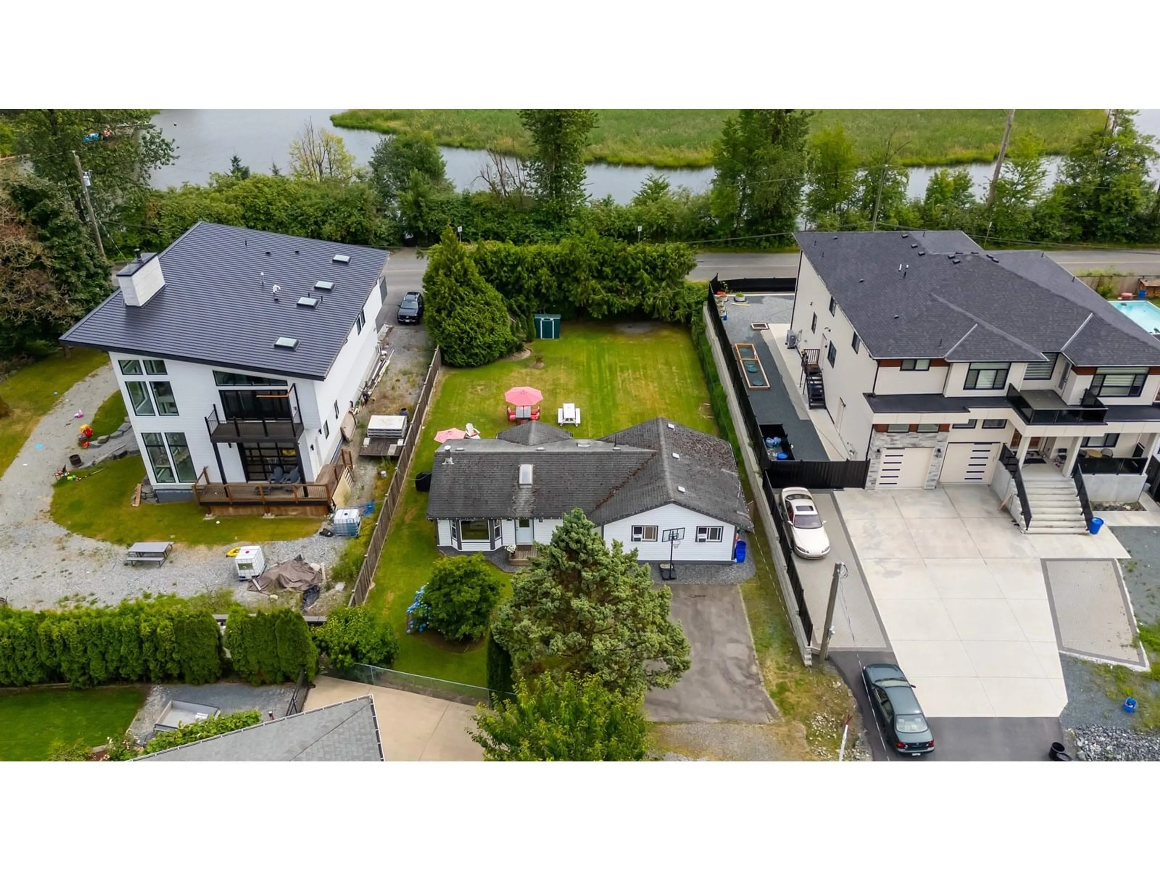 A pic from outside/outdoor area/front of a property/back of a property/a pic from drone, unknown for 35720 MOORE, Mission British Columbia V4X1Y3