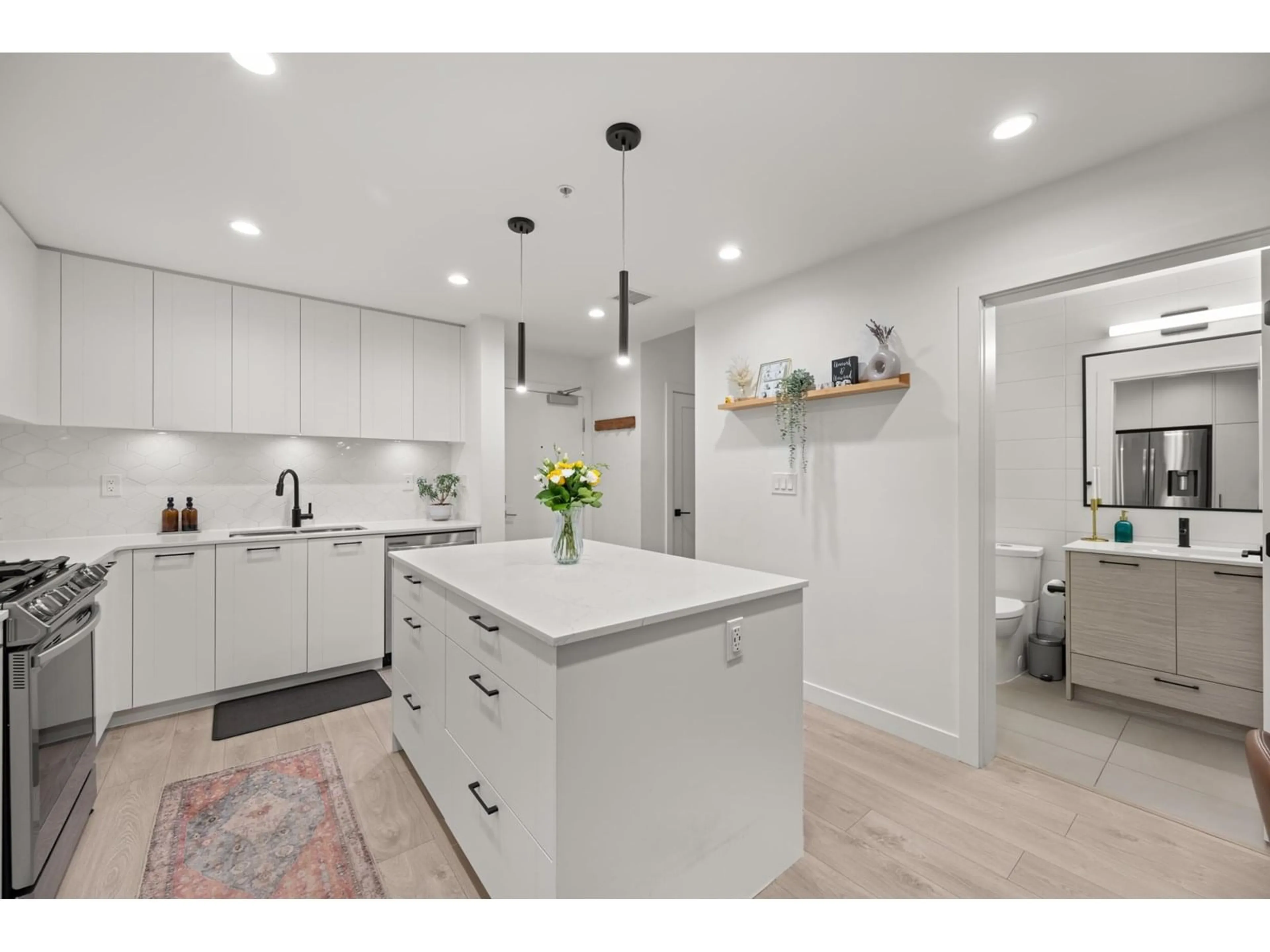 Open concept kitchen, ceramic/tile floor for C104 - 20052 83A, Langley British Columbia V2Y3P4