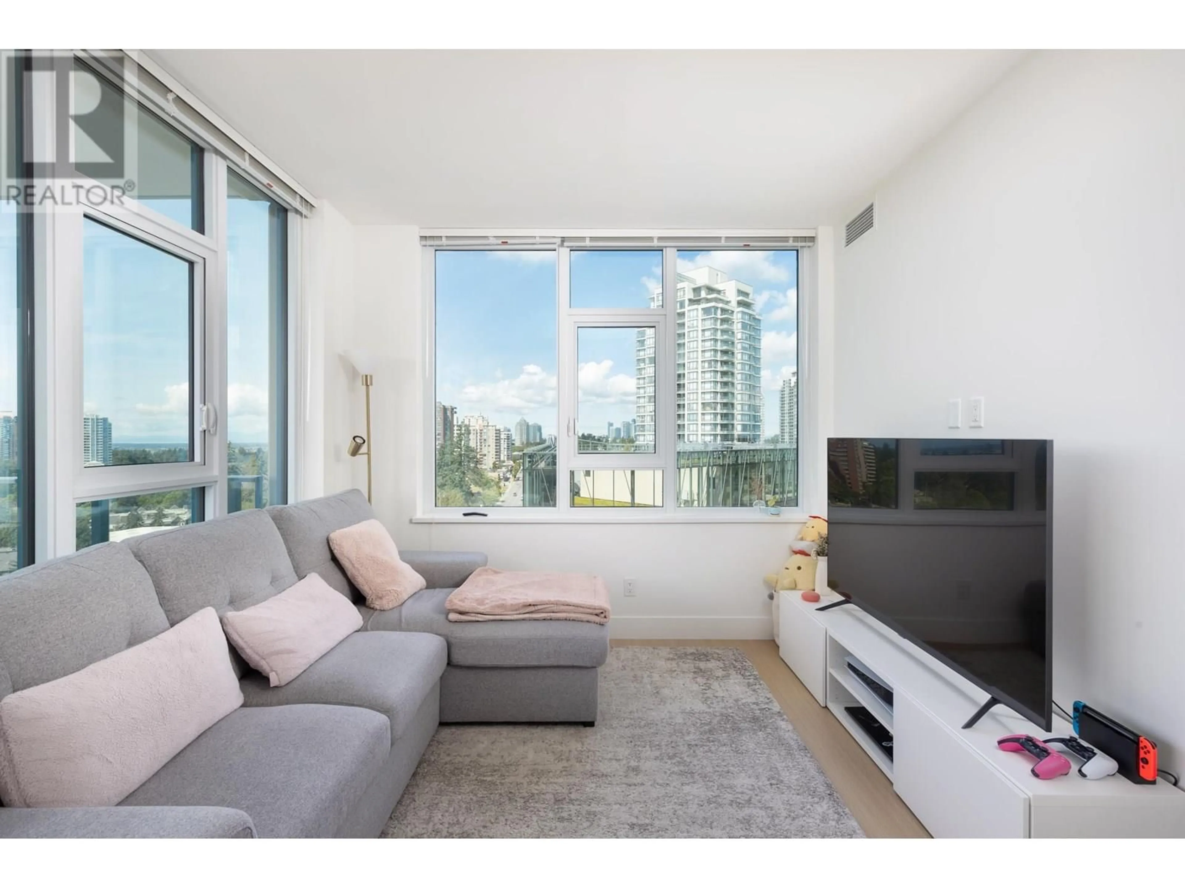 Living room with furniture, unknown for 1210 - 7388 KINGSWAY, Burnaby British Columbia V3N0G9