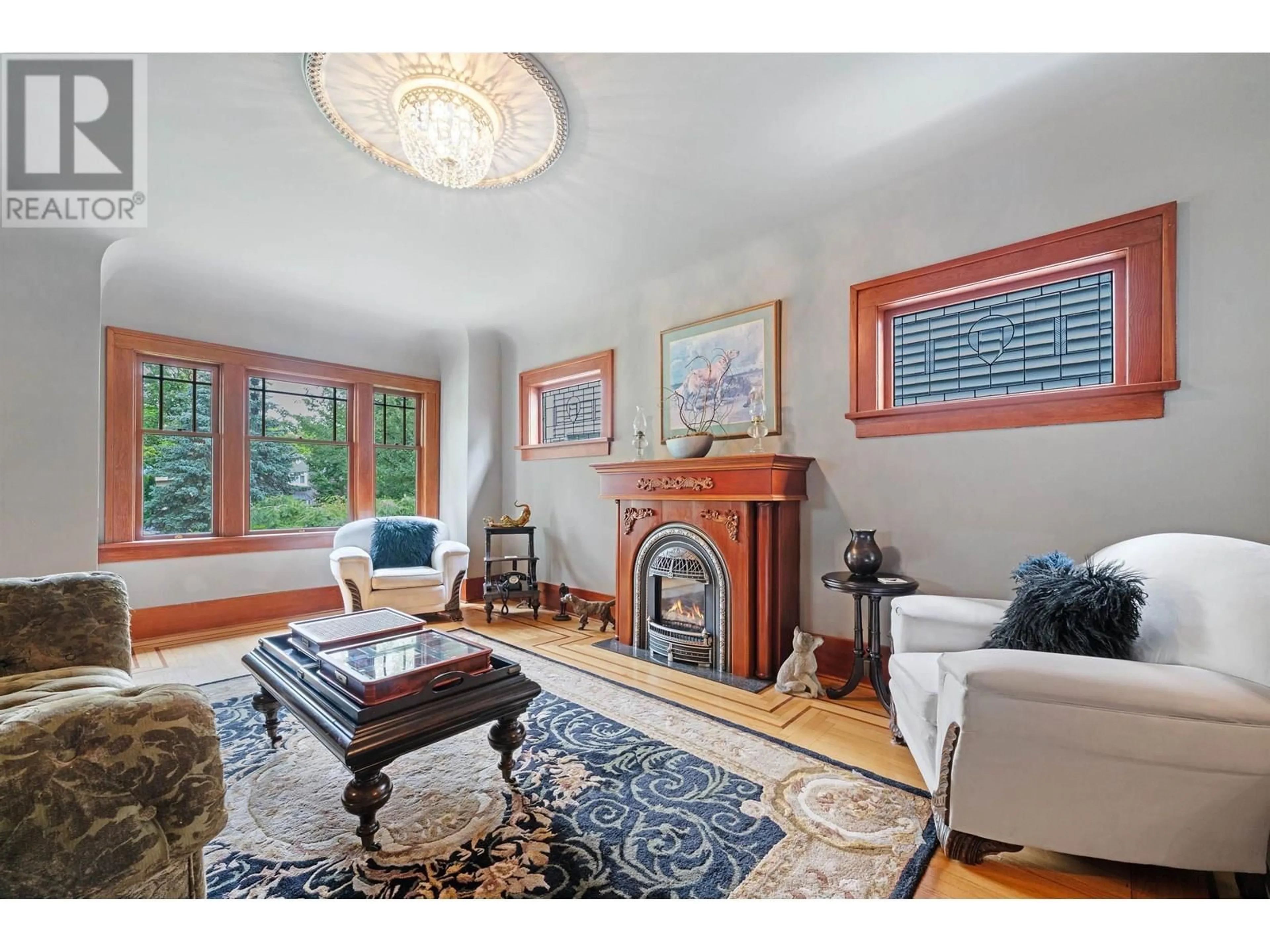 Living room with furniture, wood/laminate floor for 3534 KING EDWARD AVENUE, Vancouver British Columbia V6S1M5