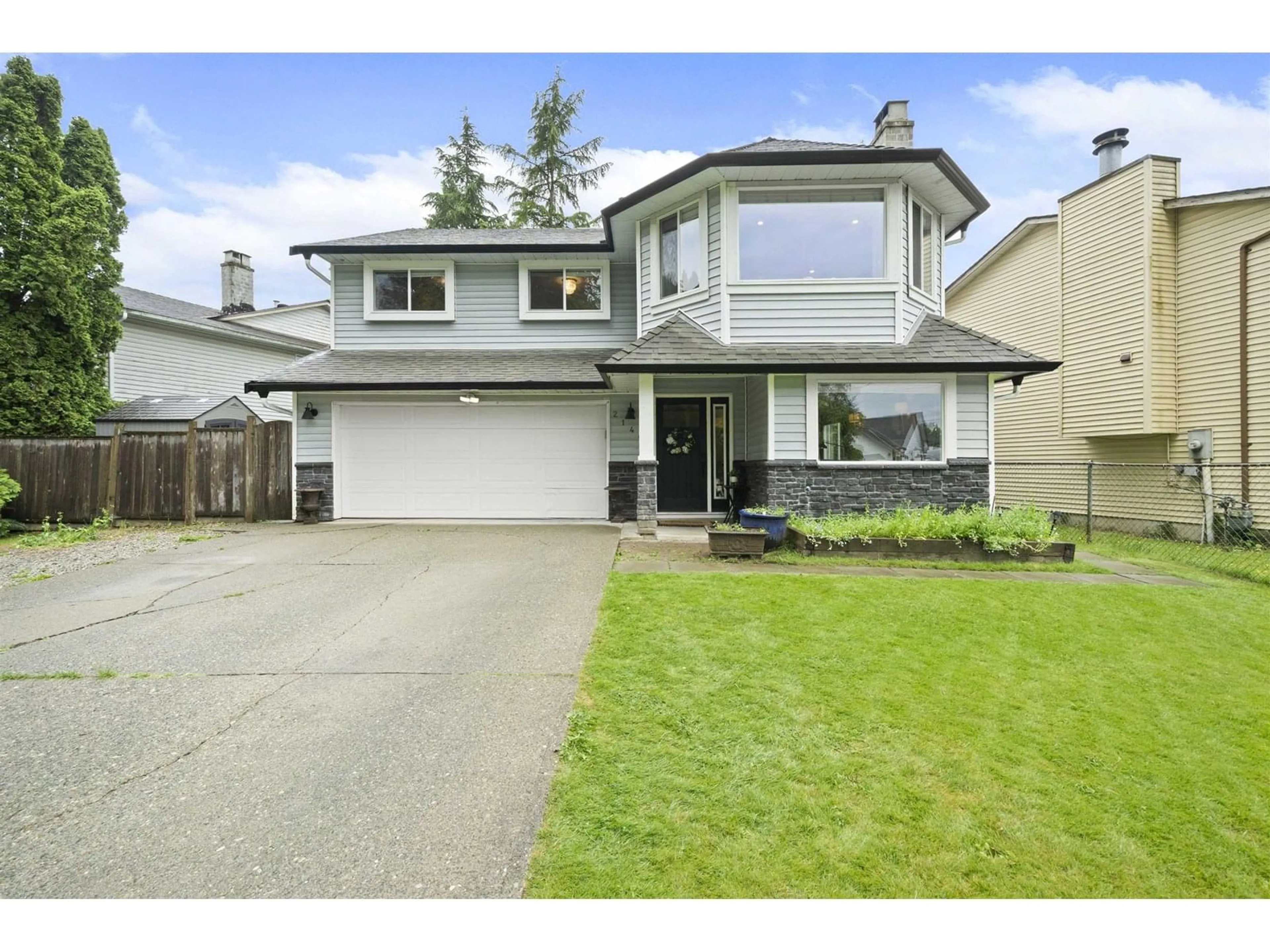 Home with vinyl exterior material, street for 21468 95, Langley British Columbia V1M1W5