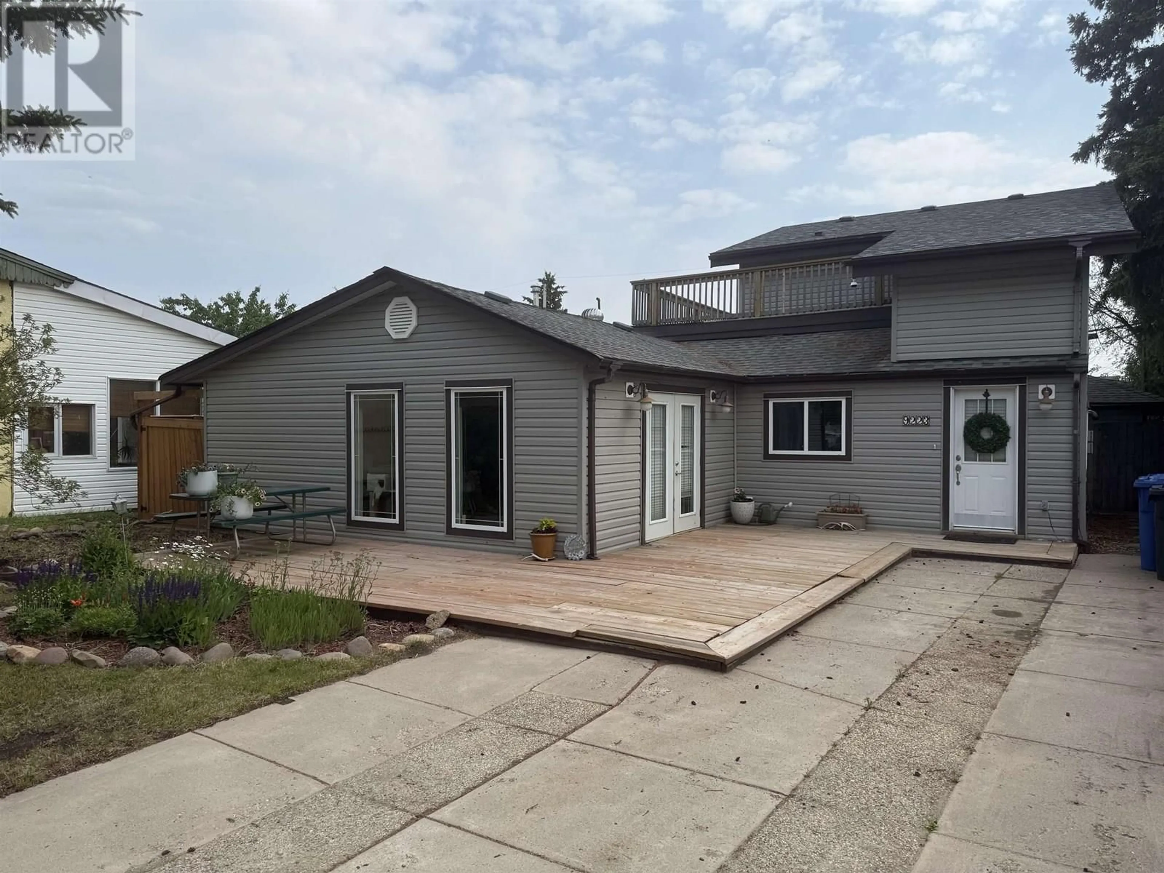 Home with vinyl exterior material, street for 9223 104 AVENUE, Fort St. John British Columbia V1J2J6