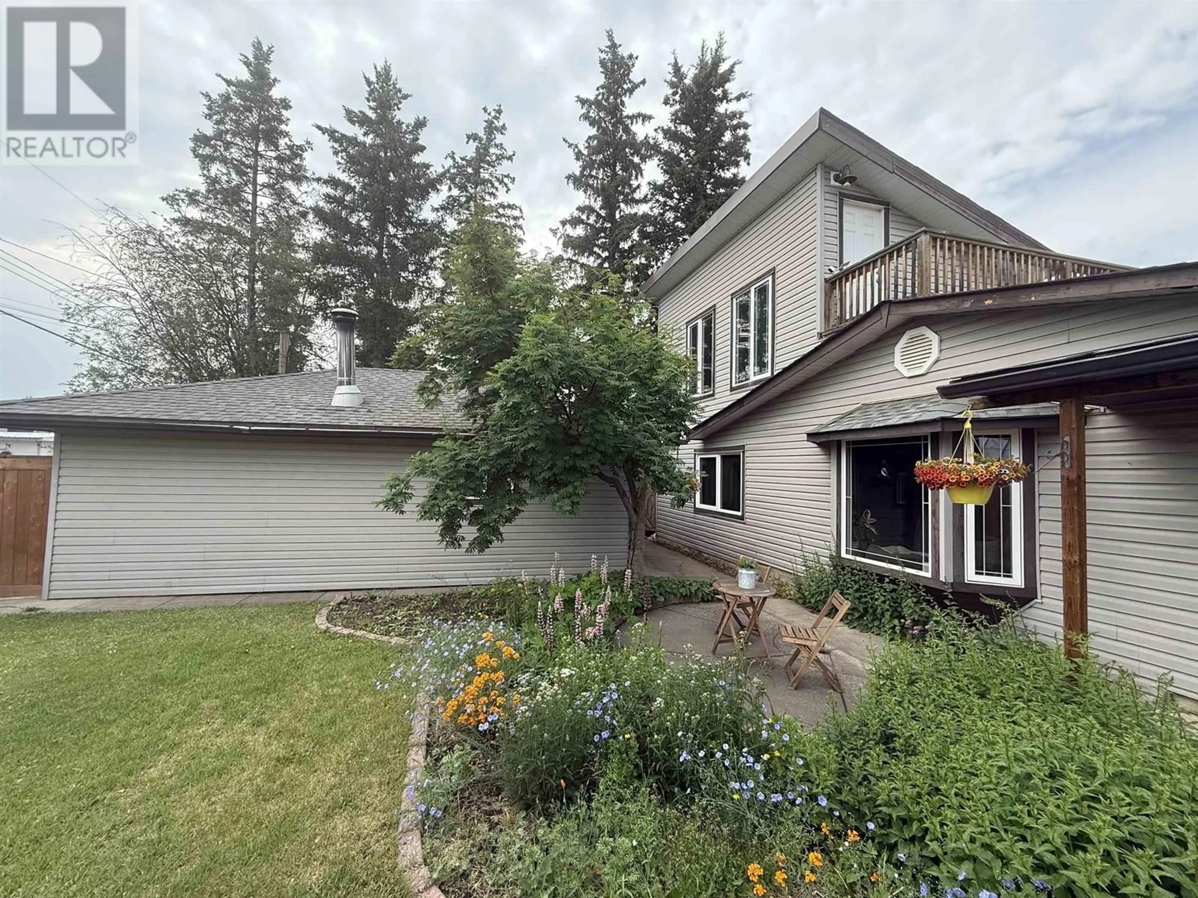 A pic from outside/outdoor area/front of a property/back of a property/a pic from drone, street for 9223 104 AVENUE, Fort St. John British Columbia V1J2J6