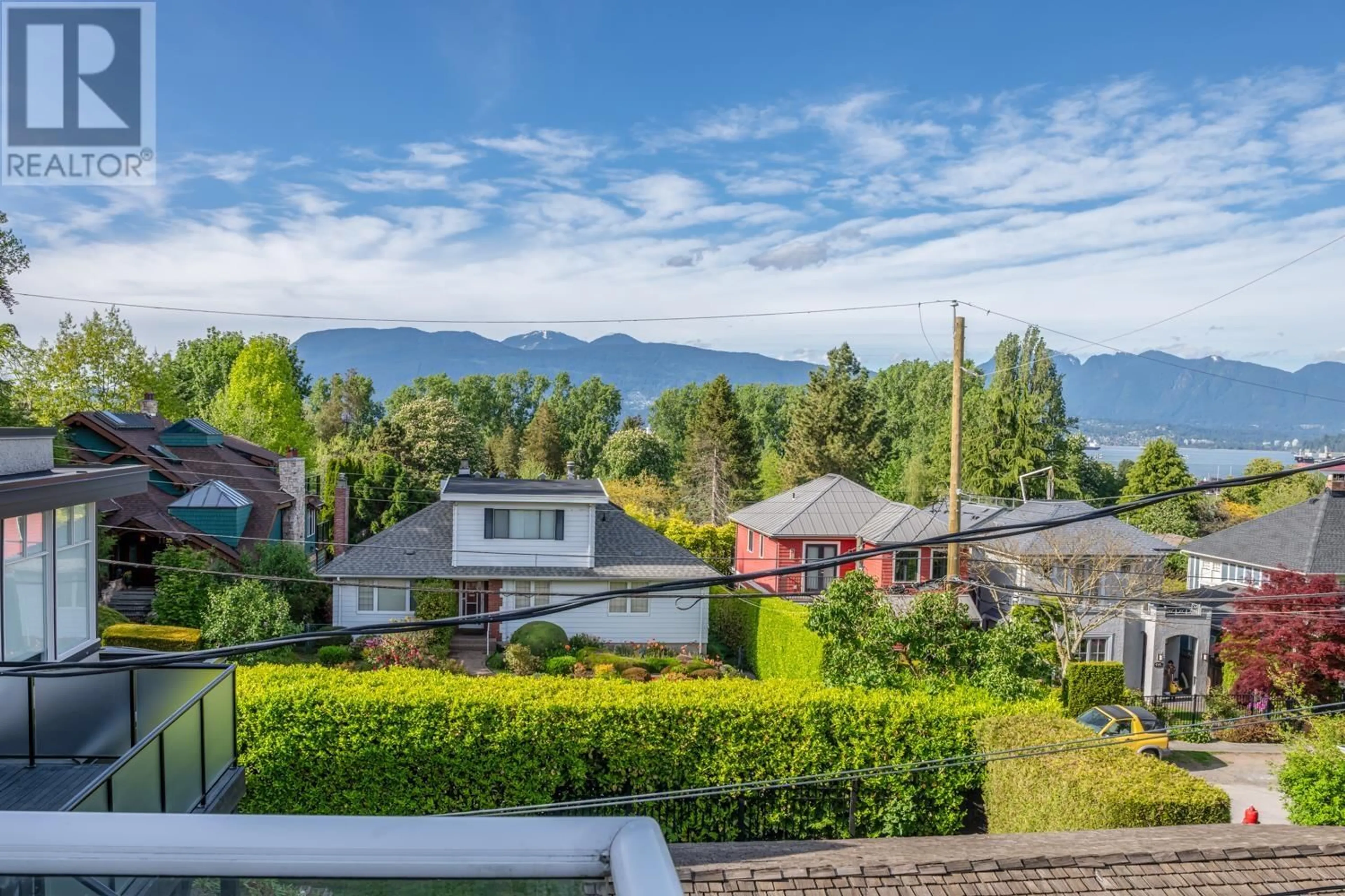 A pic from outside/outdoor area/front of a property/back of a property/a pic from drone, mountain view for 4389 LOCARNO CRESCENT, Vancouver British Columbia V6R1G2