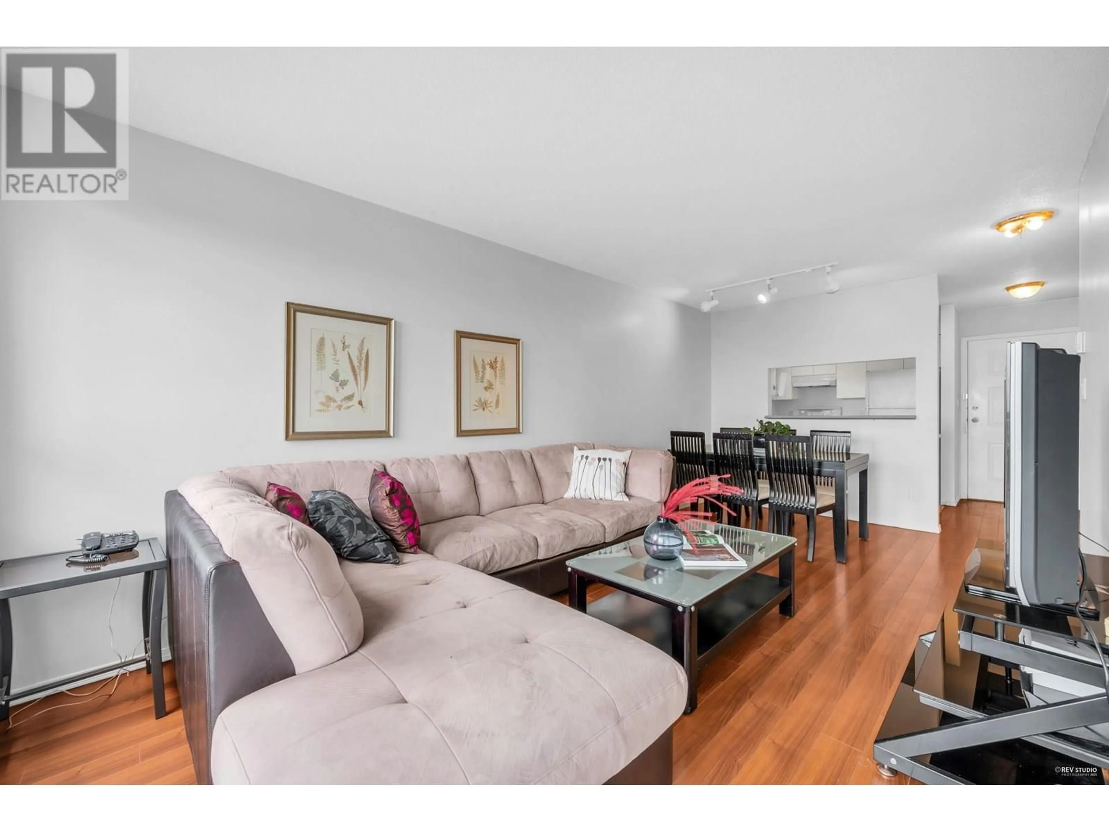 Living room with furniture, wood/laminate floor for 1007 - 3489 ASCOT PLACE, Vancouver British Columbia V5R6B6