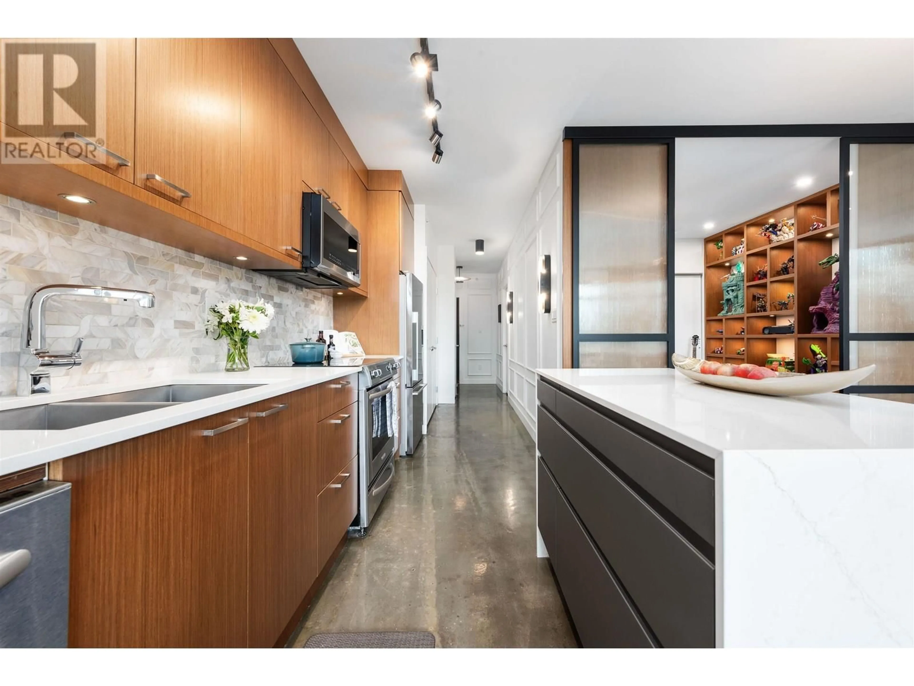 Contemporary kitchen, ceramic/tile floor for 415 - 221 UNION STREET, Vancouver British Columbia V6A0B4