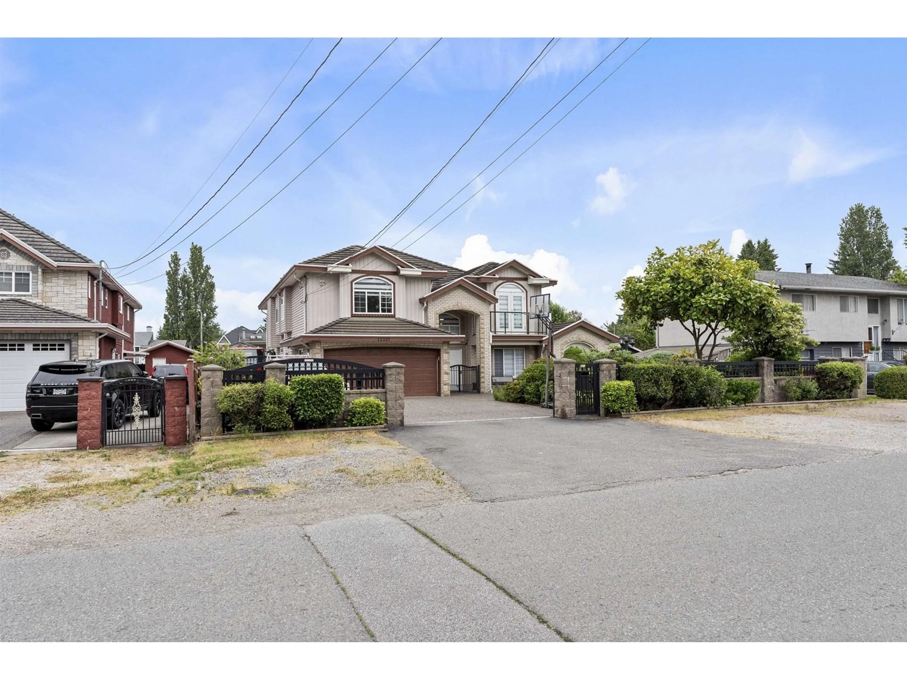 A pic from outside/outdoor area/front of a property/back of a property/a pic from drone, street for 12257 97TH, Surrey British Columbia V3V2C8