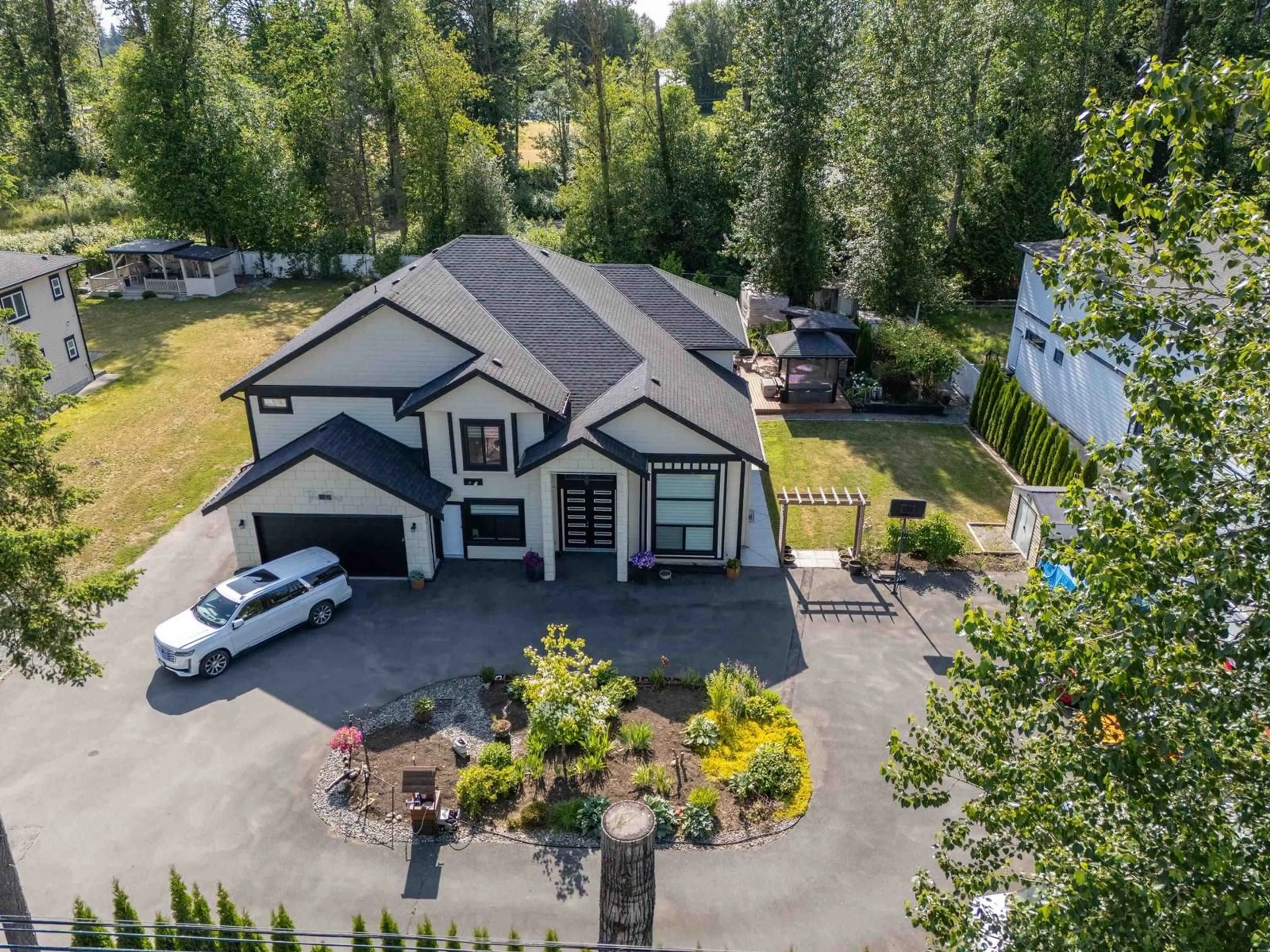 A pic from outside/outdoor area/front of a property/back of a property/a pic from drone, mountain view for 2365 264, Langley British Columbia V4W2L5
