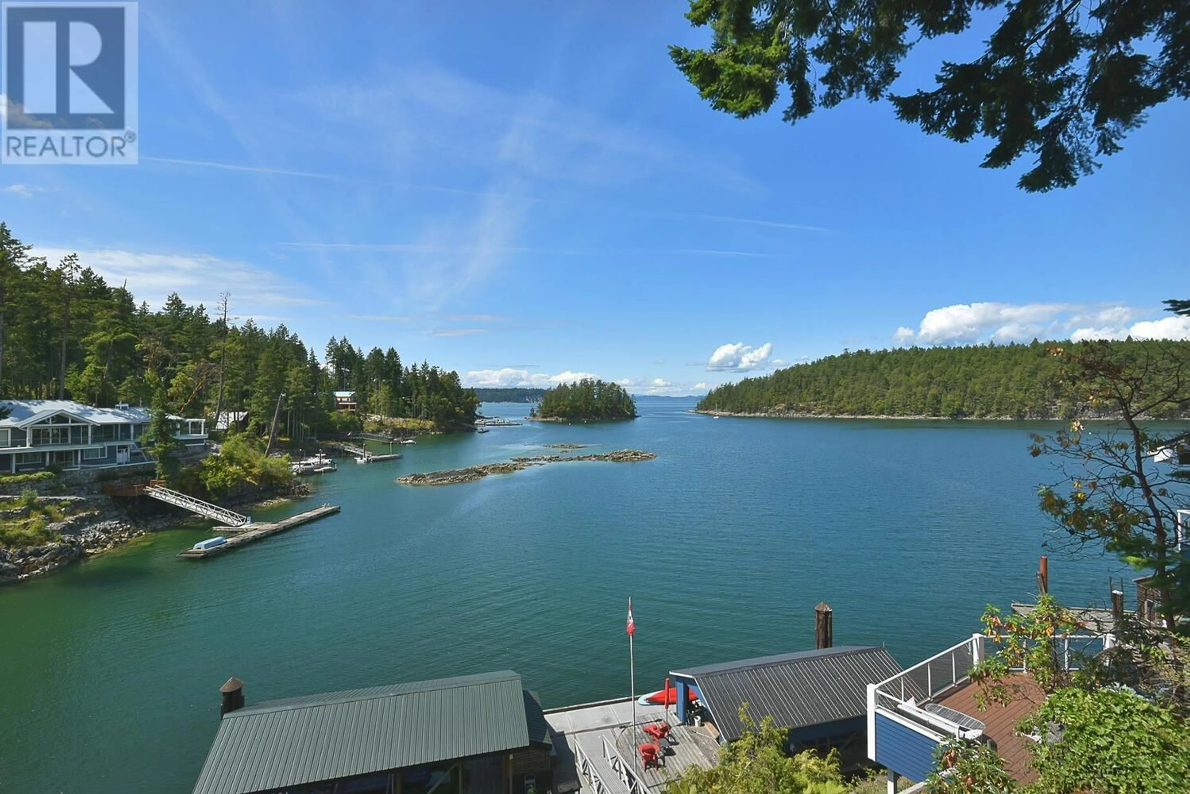 A pic from outside/outdoor area/front of a property/back of a property/a pic from drone, water/lake/river/ocean view for 5386 SANS SOUCI ROAD, Halfmoon Bay British Columbia V7Z1B6