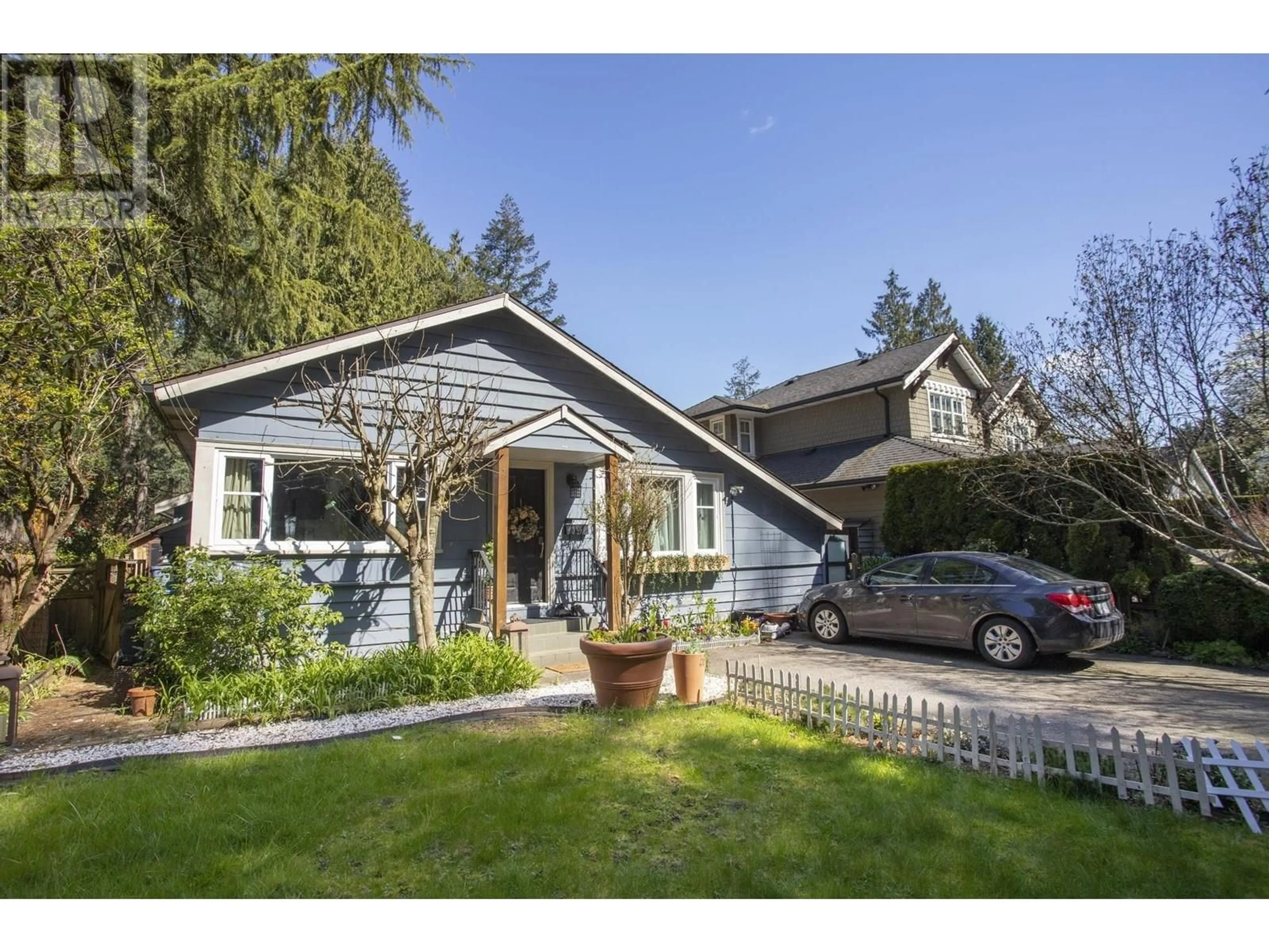 Home with vinyl exterior material, street for 1232 21ST STREET, North Vancouver British Columbia V7P2C9