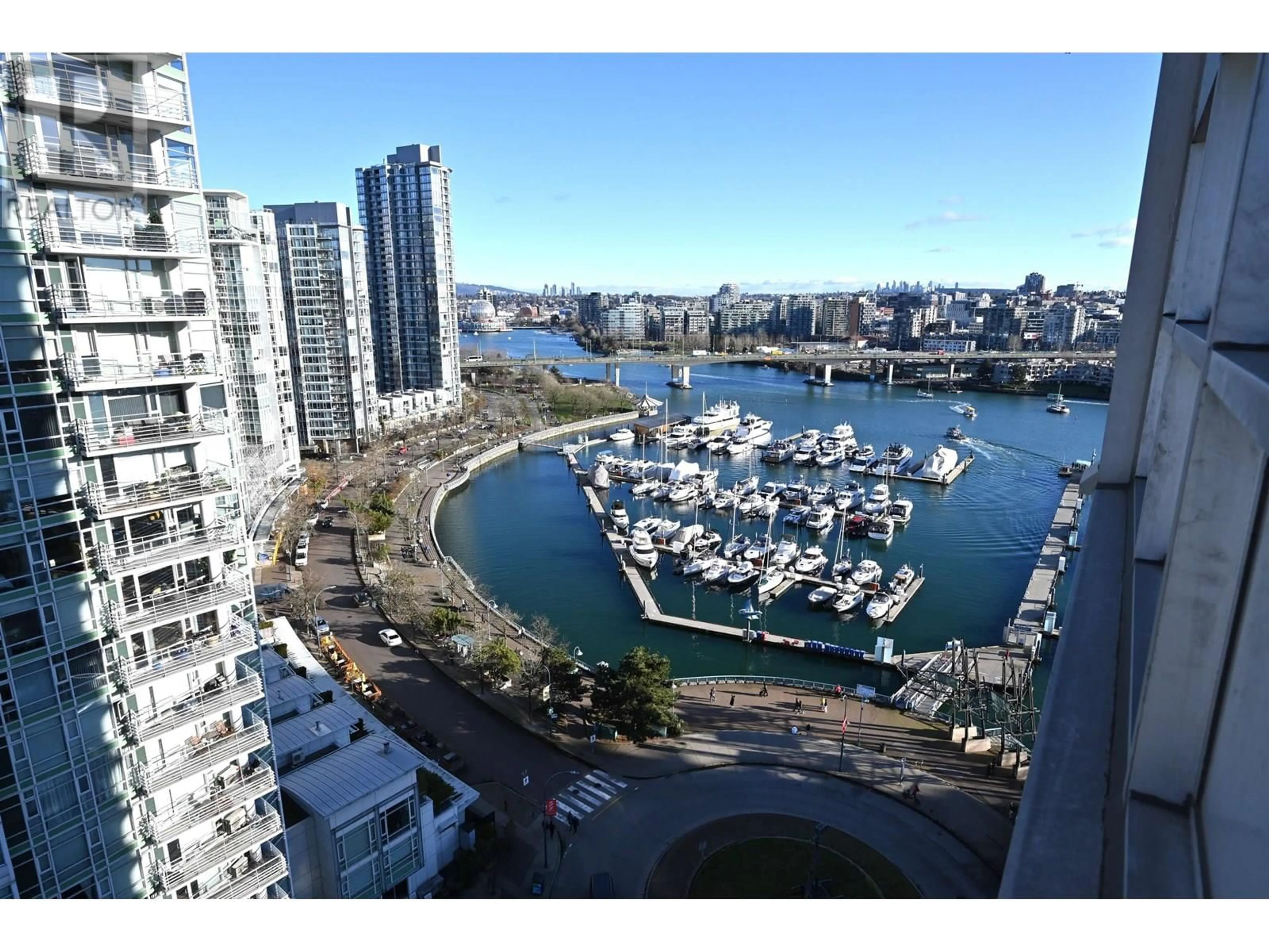 A pic from outside/outdoor area/front of a property/back of a property/a pic from drone, water/lake/river/ocean view for 2002 - 1201 MARINASIDE CRESCENT, Vancouver British Columbia V6Z2V2