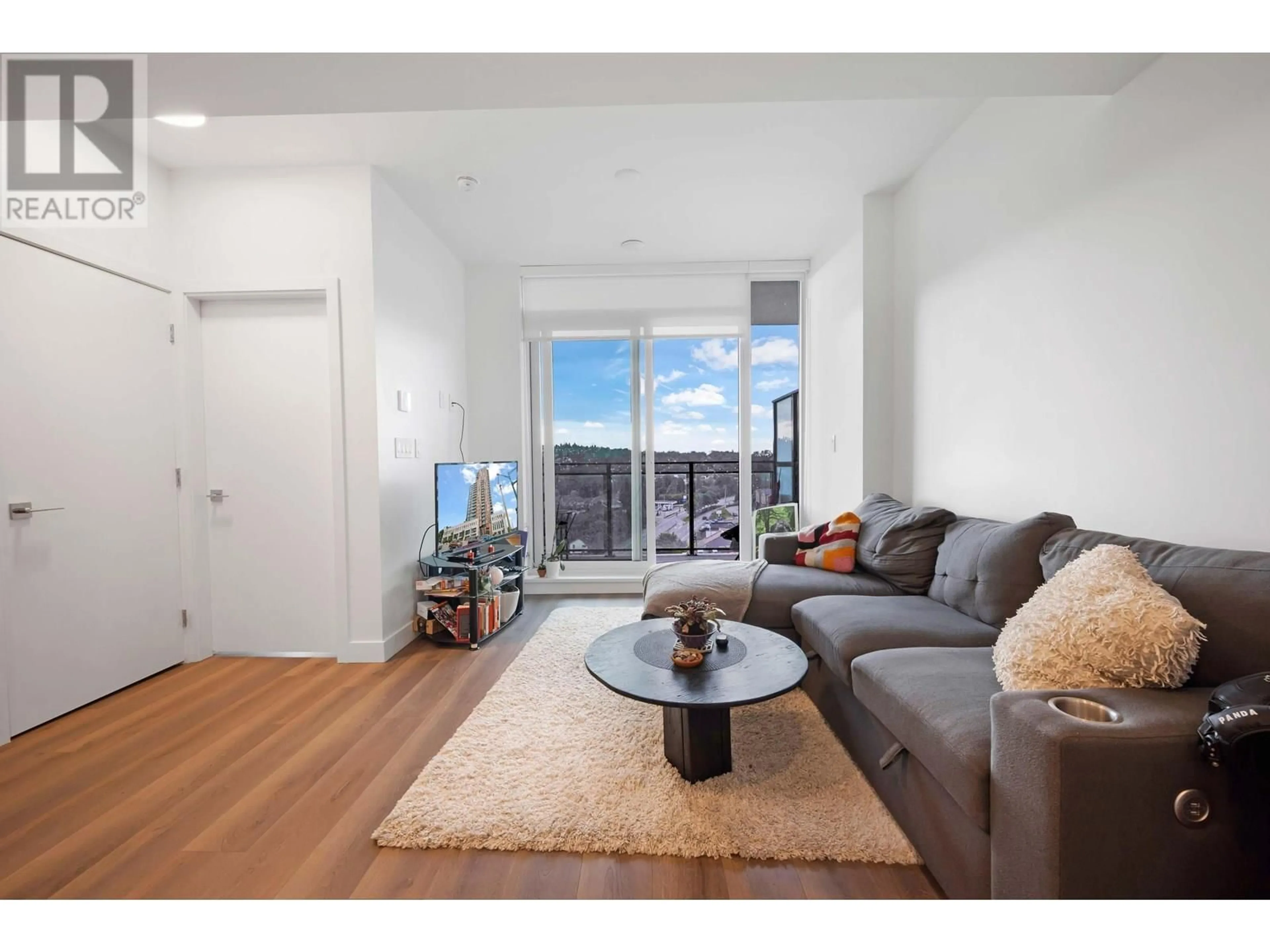 Living room with furniture, wood/laminate floor for 1405 - 901 LOUGHEED HIGHWAY, Coquitlam British Columbia V3K0J3