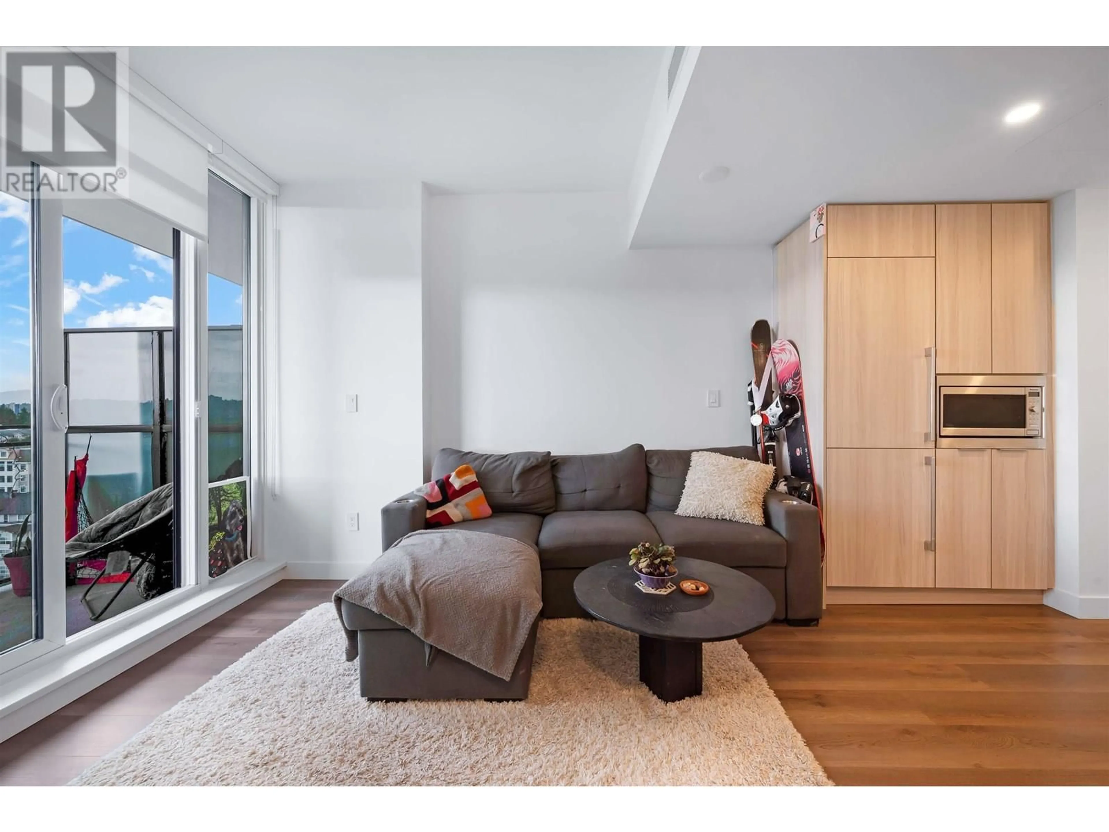 Living room with furniture, wood/laminate floor for 1405 - 901 LOUGHEED HIGHWAY, Coquitlam British Columbia V3K0J3