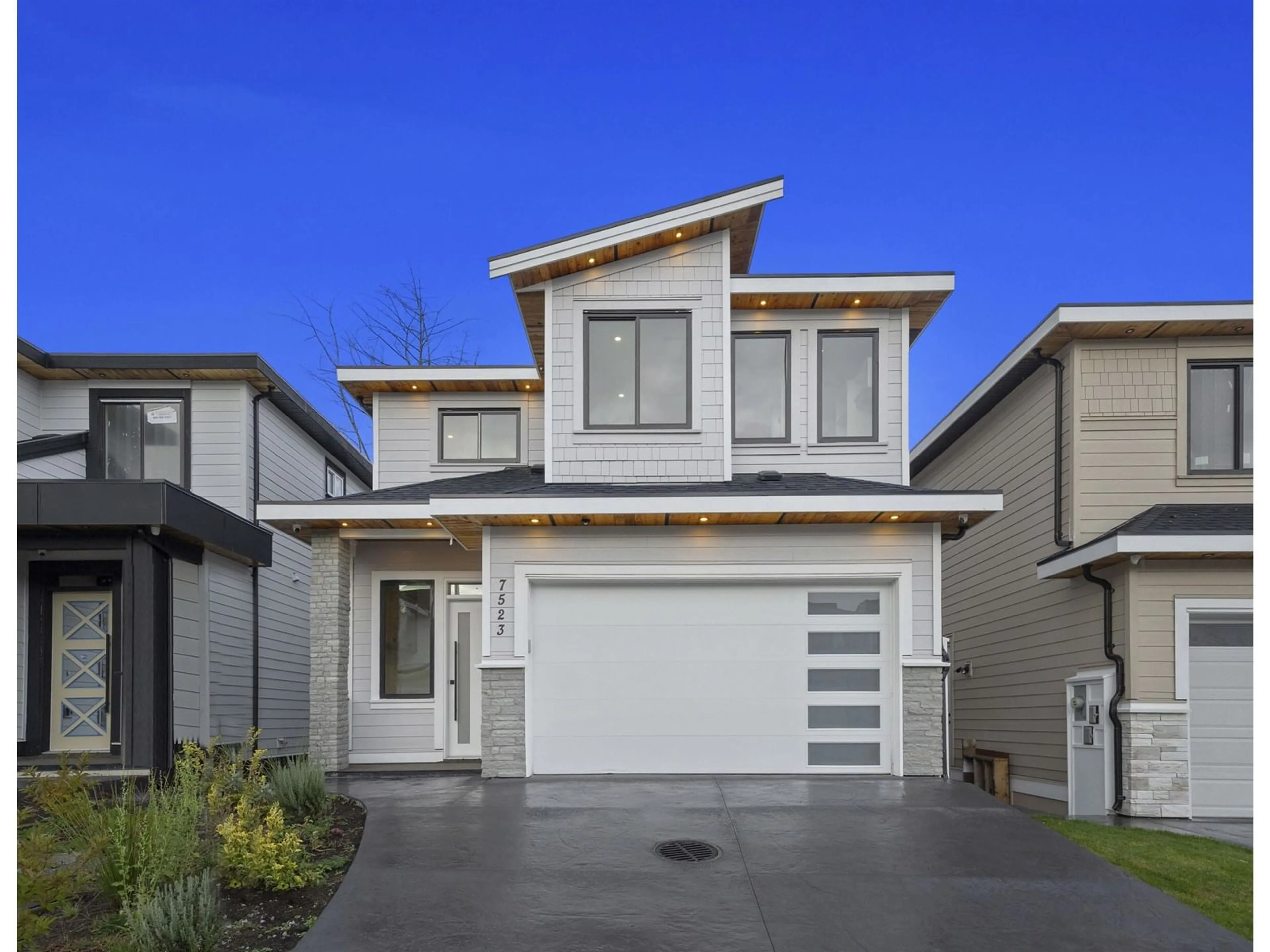 Home with vinyl exterior material, street for 7523 205, Langley British Columbia V2Y3S8