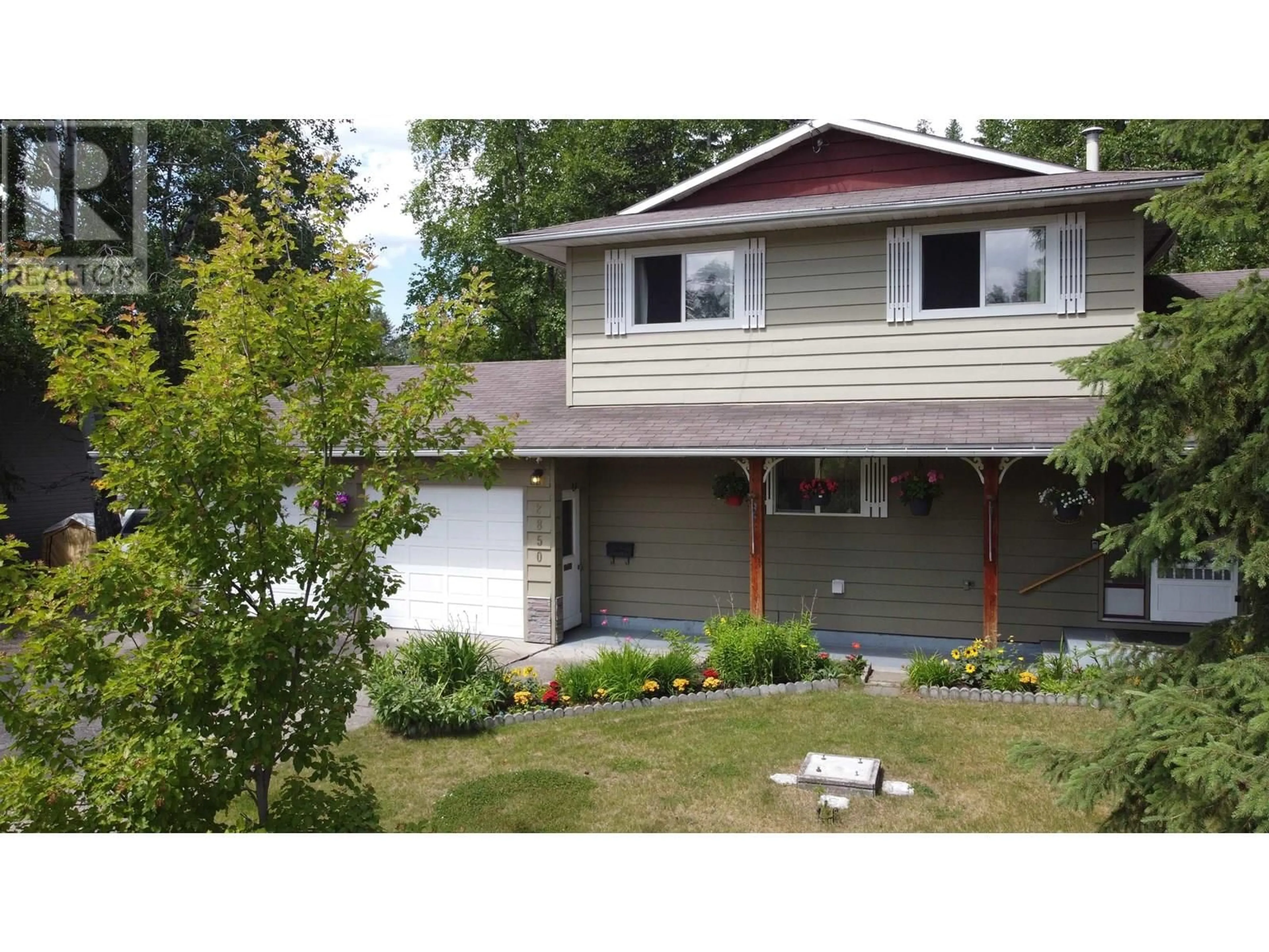 Home with vinyl exterior material, street for 2850 GAVLIN ROAD, Quesnel British Columbia V2J4Z9