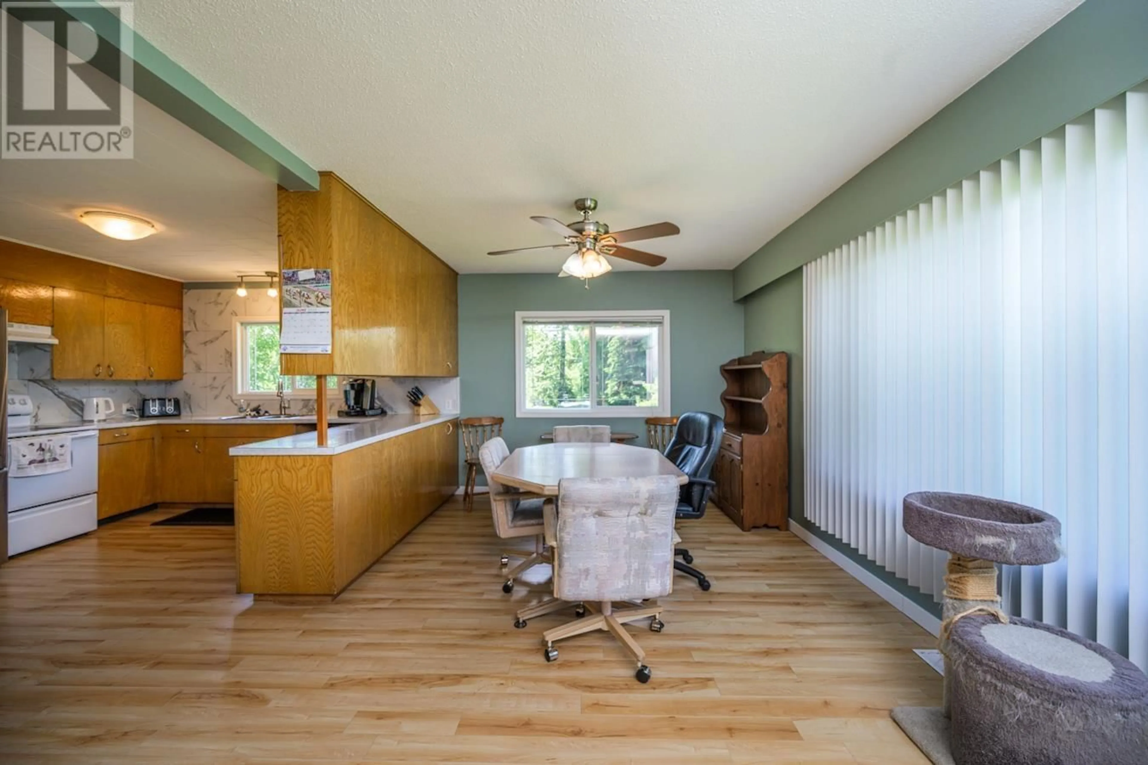 Open concept kitchen, wood/laminate floor for 4401 CHESTNUT DRIVE, Prince George British Columbia V2K2T4