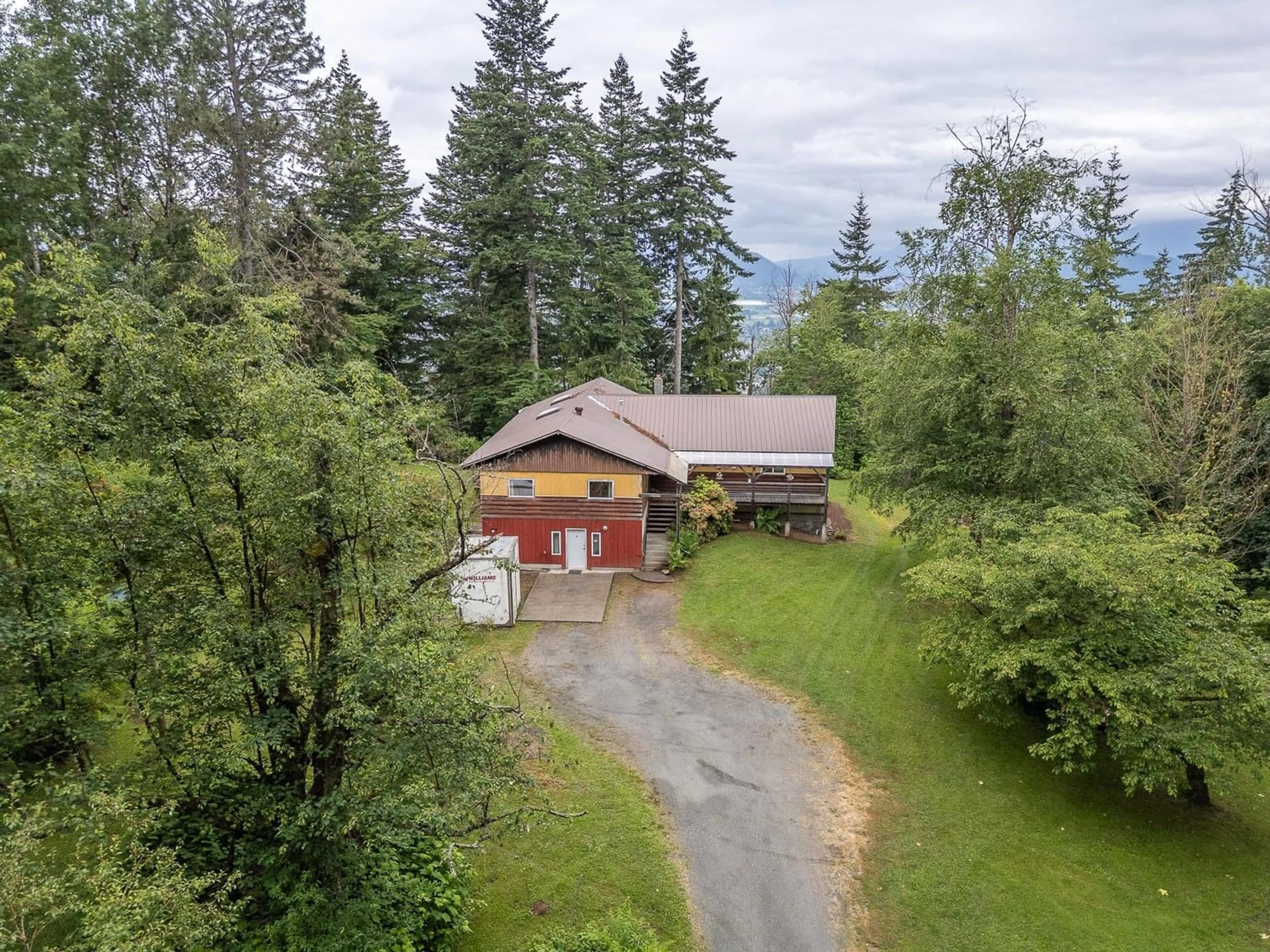 A pic from outside/outdoor area/front of a property/back of a property/a pic from drone, mountain view for 47325 EXTROM ROAD, Chilliwack British Columbia V2R4V1