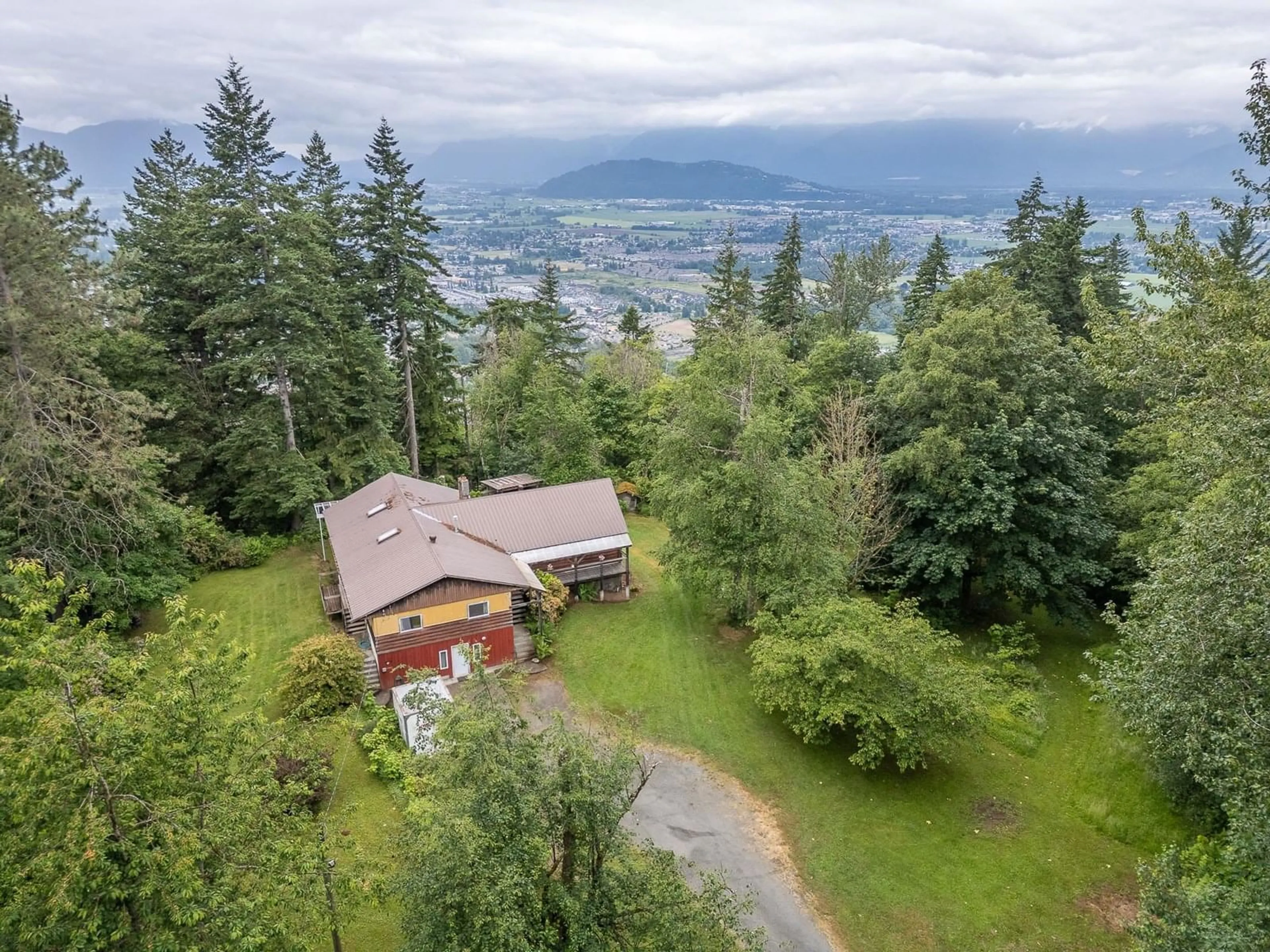 A pic from outside/outdoor area/front of a property/back of a property/a pic from drone, mountain view for 47325 EXTROM ROAD, Chilliwack British Columbia V2R4V1