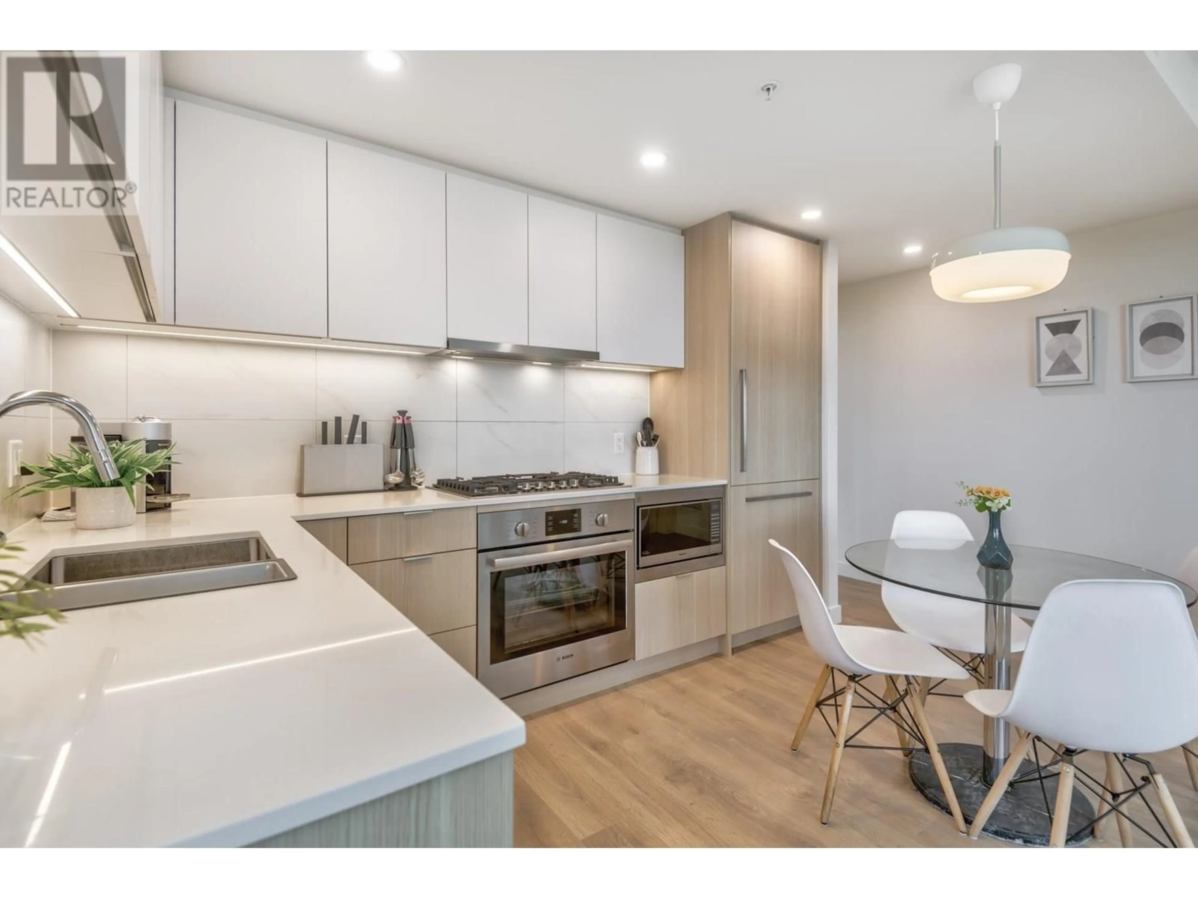 Open concept kitchen, wood/laminate floor for 1307 - 318 ALDERSON AVENUE, Coquitlam British Columbia V3K0J1