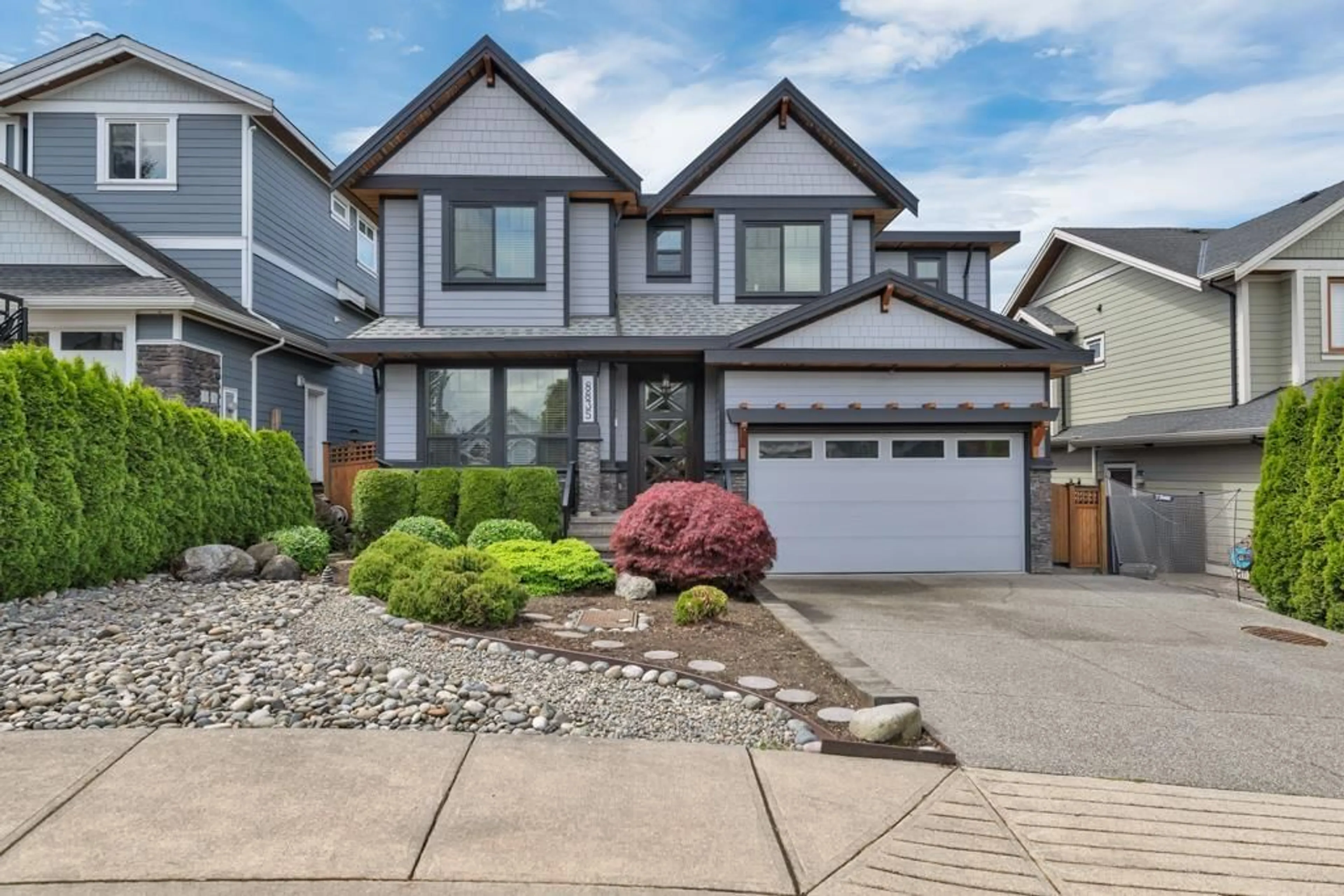 Home with vinyl exterior material, street for 8835 STEGAVIK, Delta British Columbia V4C0C6