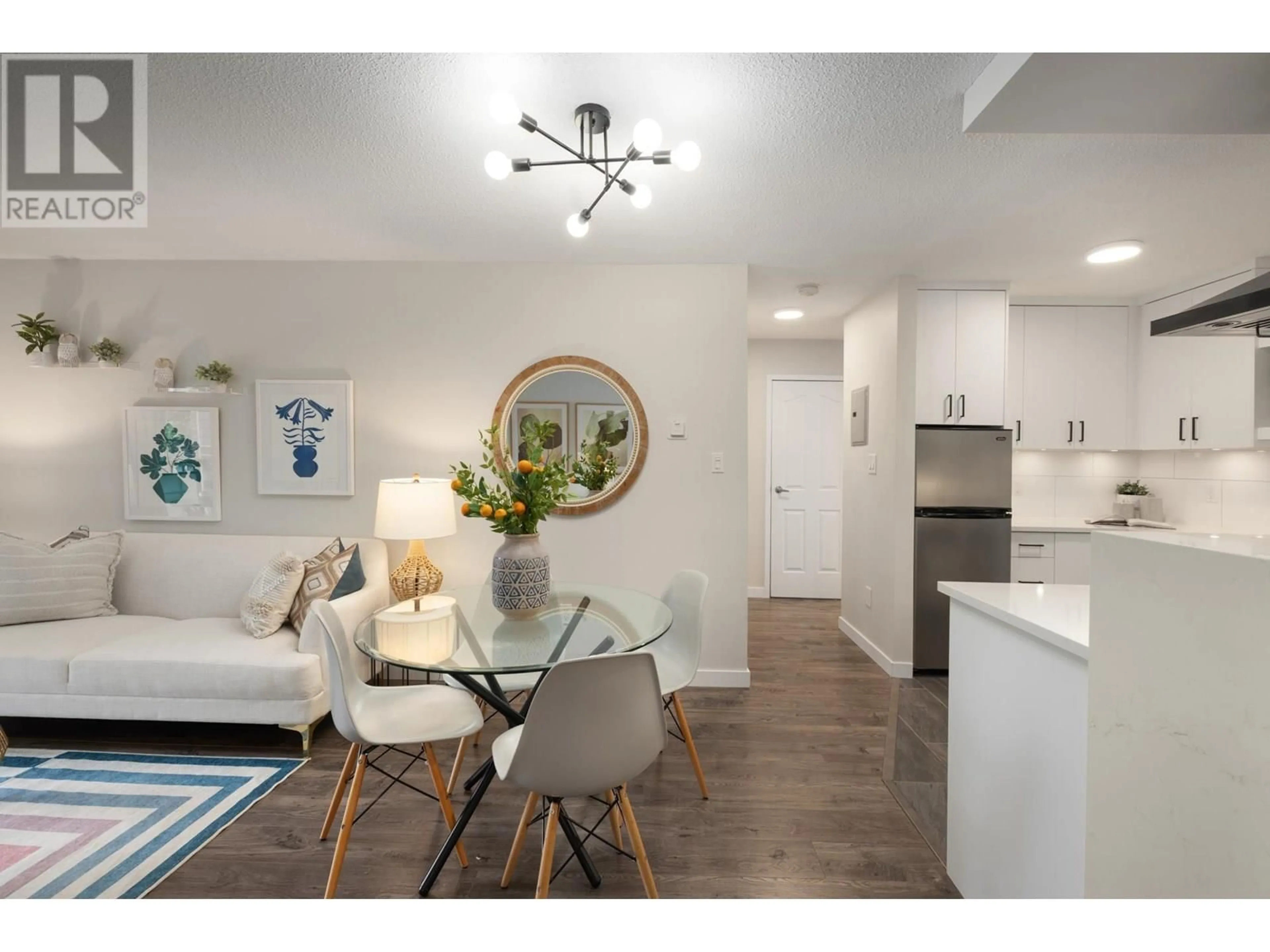 Open concept kitchen, wood/laminate floor for 403 - 360 2ND STREET, North Vancouver British Columbia V7L4N6