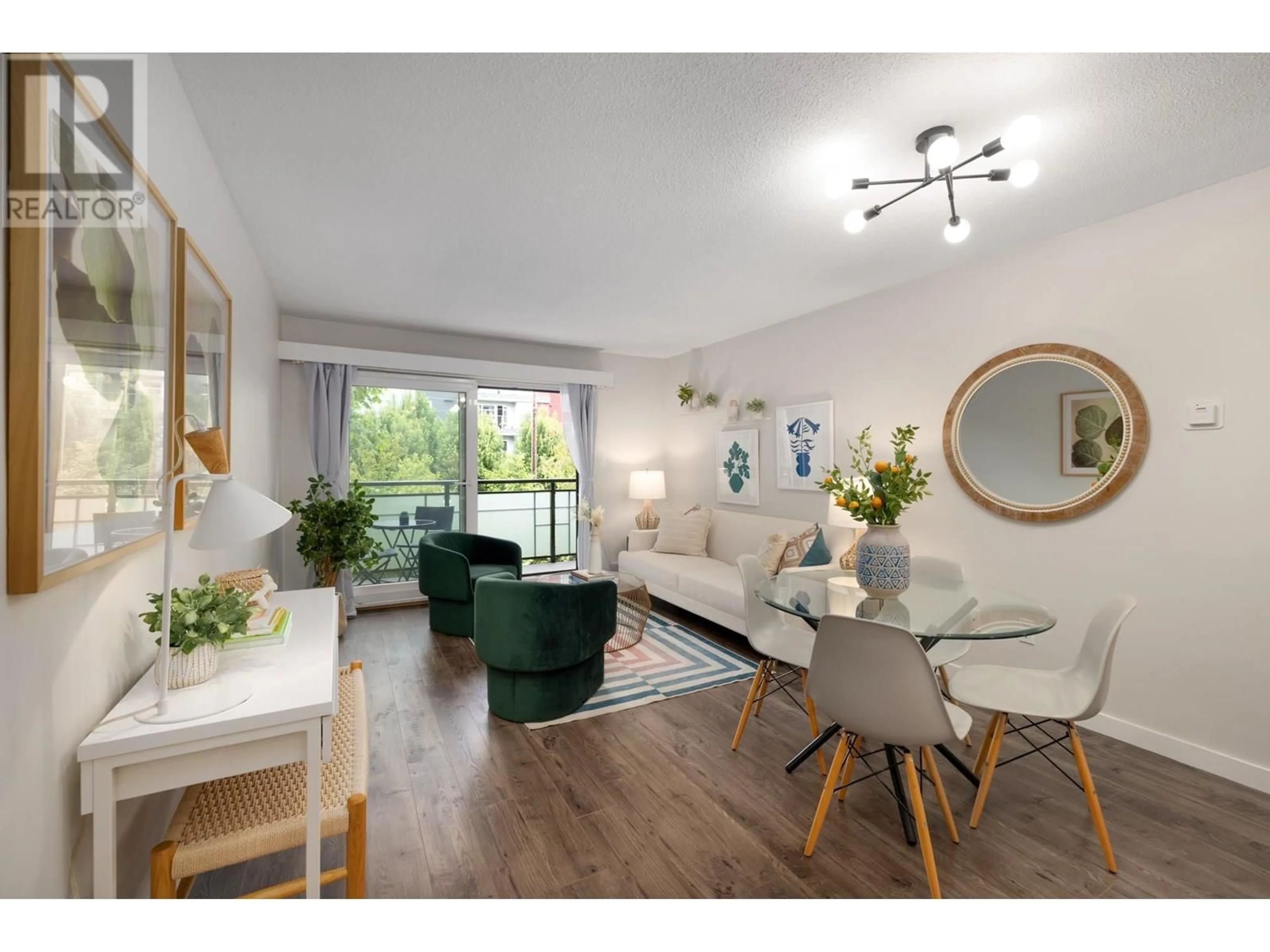 Living room with furniture, wood/laminate floor for 403 - 360 2ND STREET, North Vancouver British Columbia V7L4N6